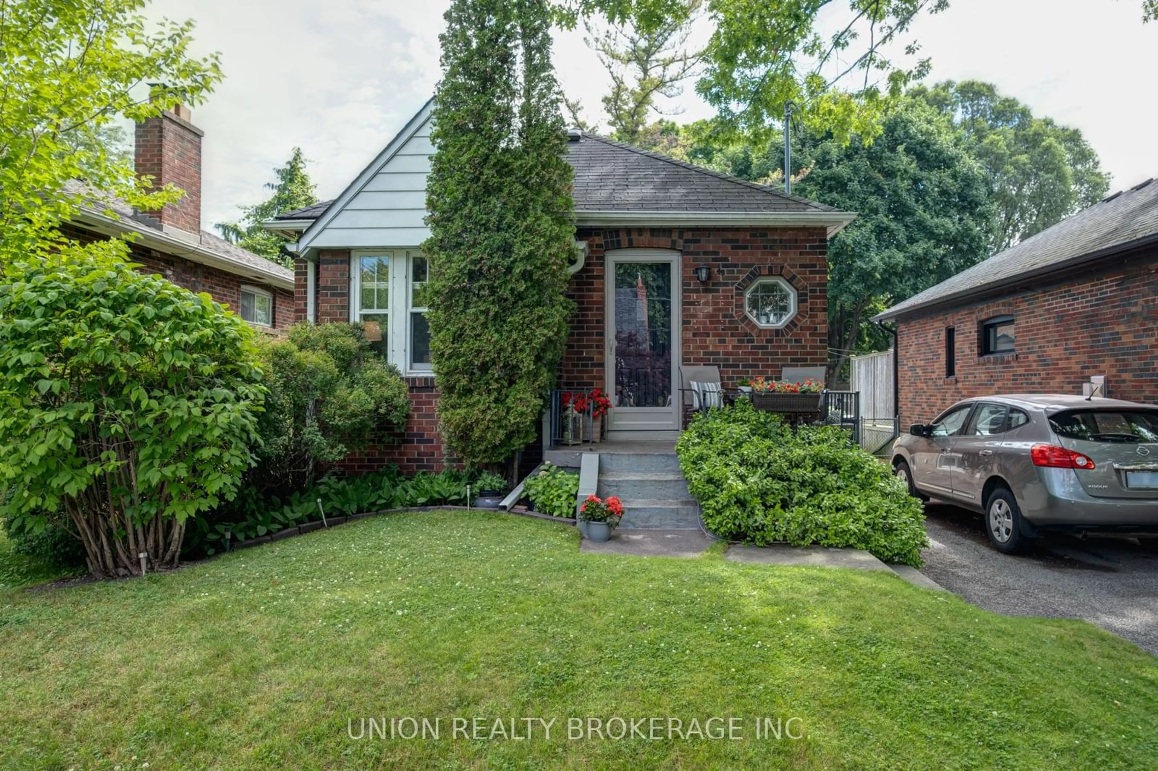 Home with brick exterior material for 49 Red Deer Ave, Toronto Ontario M1N 2Z2