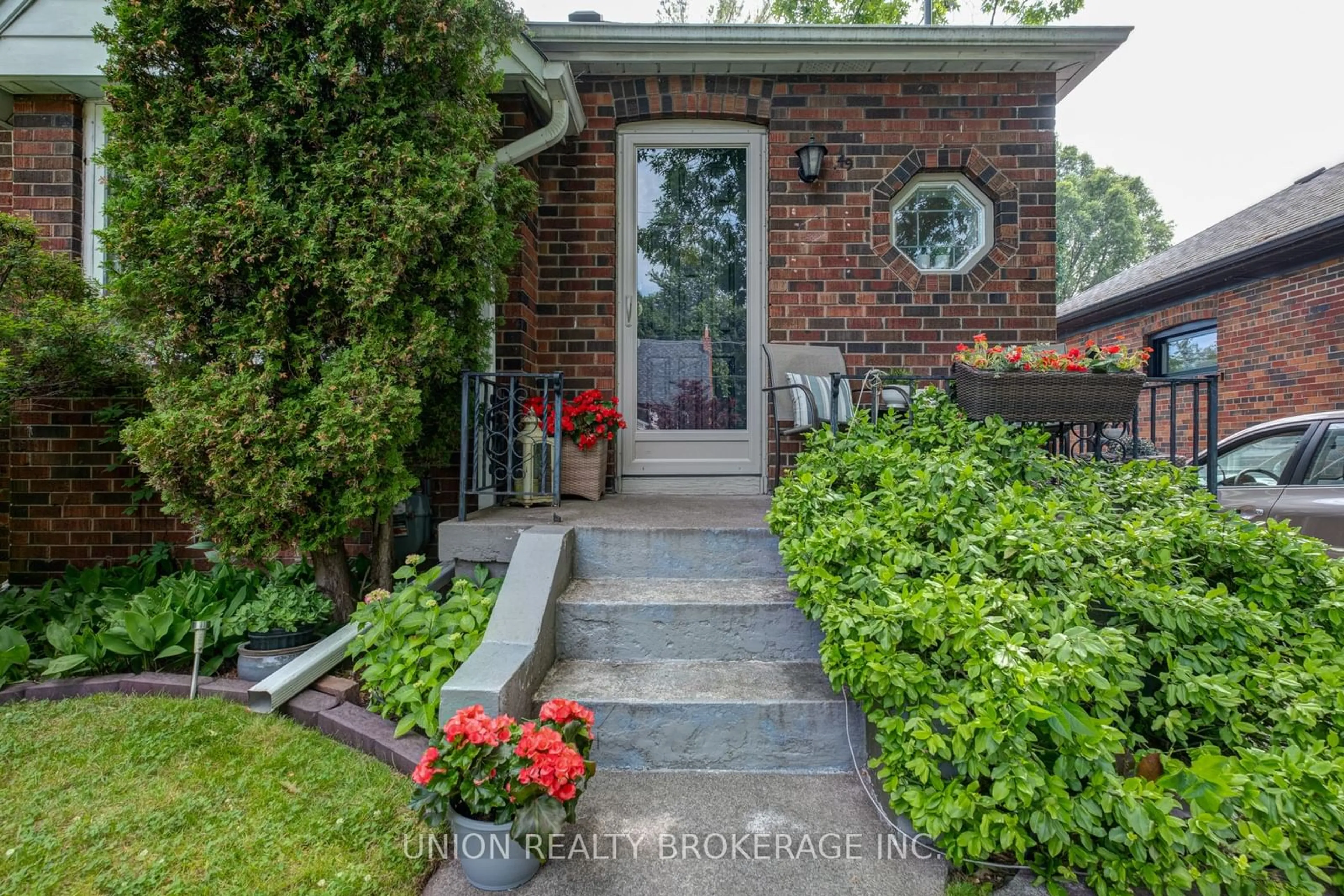 Home with brick exterior material for 49 Red Deer Ave, Toronto Ontario M1N 2Z2