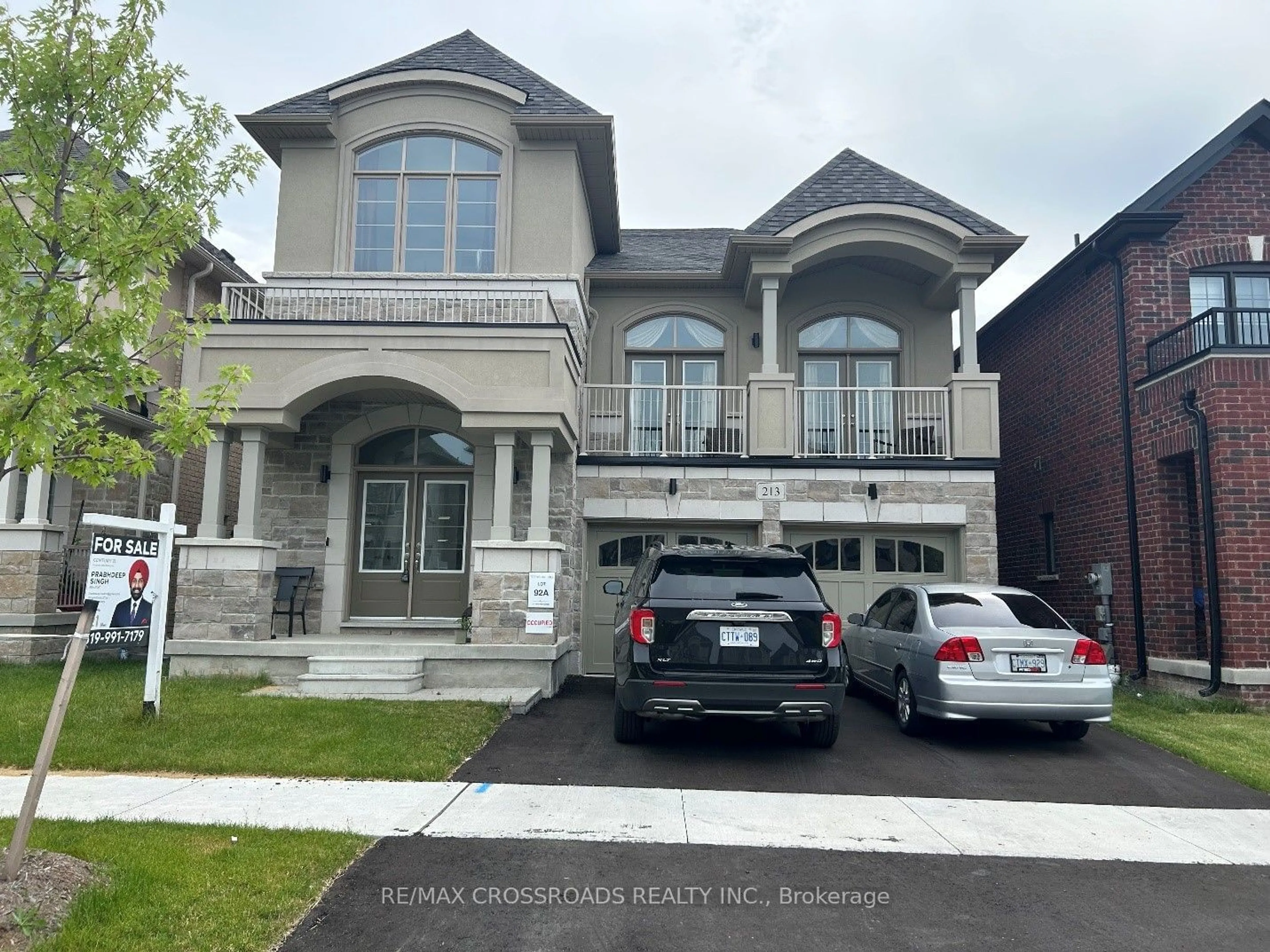 Frontside or backside of a home for 213 Doug Finney St, Oshawa Ontario L1K 3G3