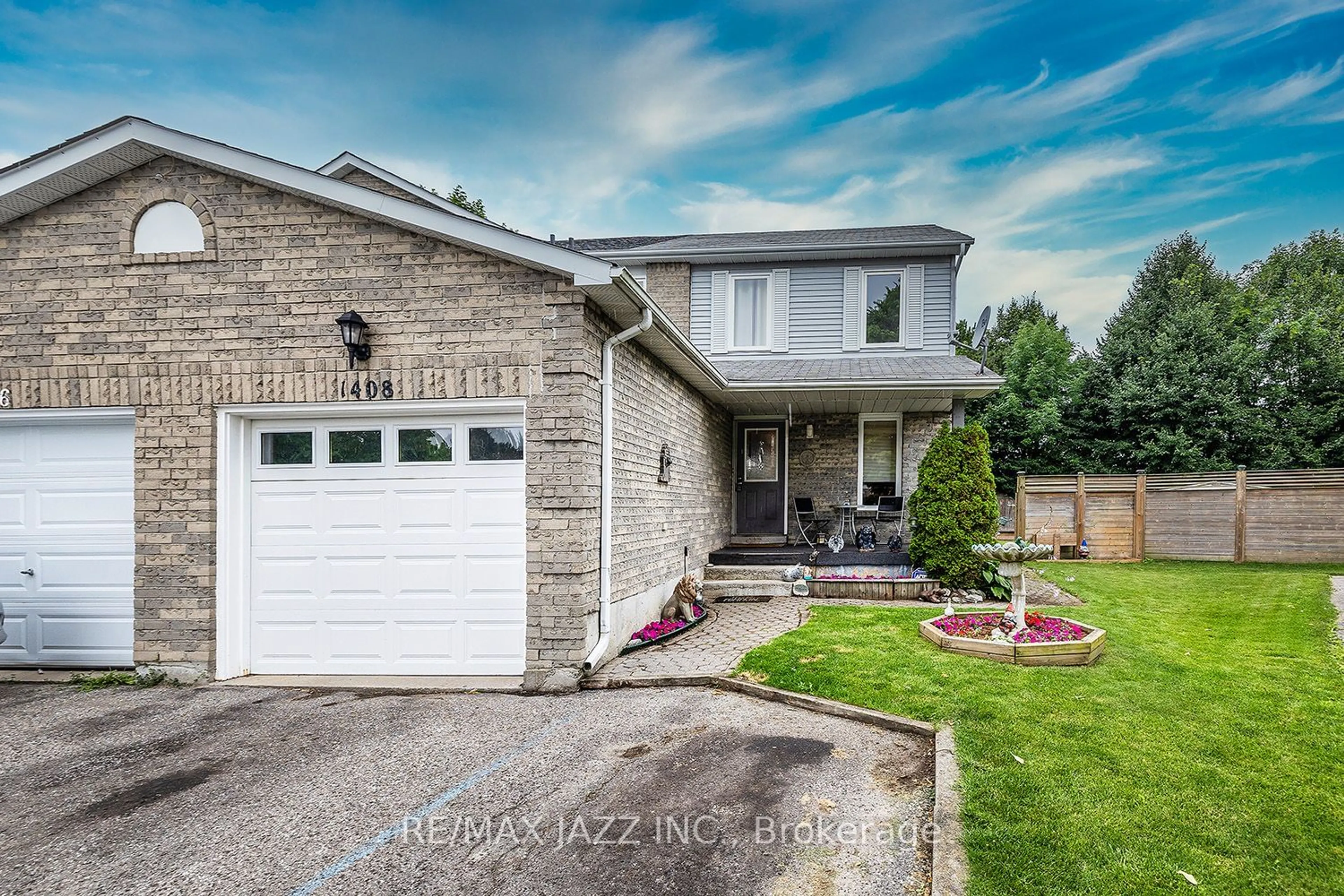 Home with brick exterior material for 1408 Beaverbrook Crt, Oshawa Ontario L1J 8L1