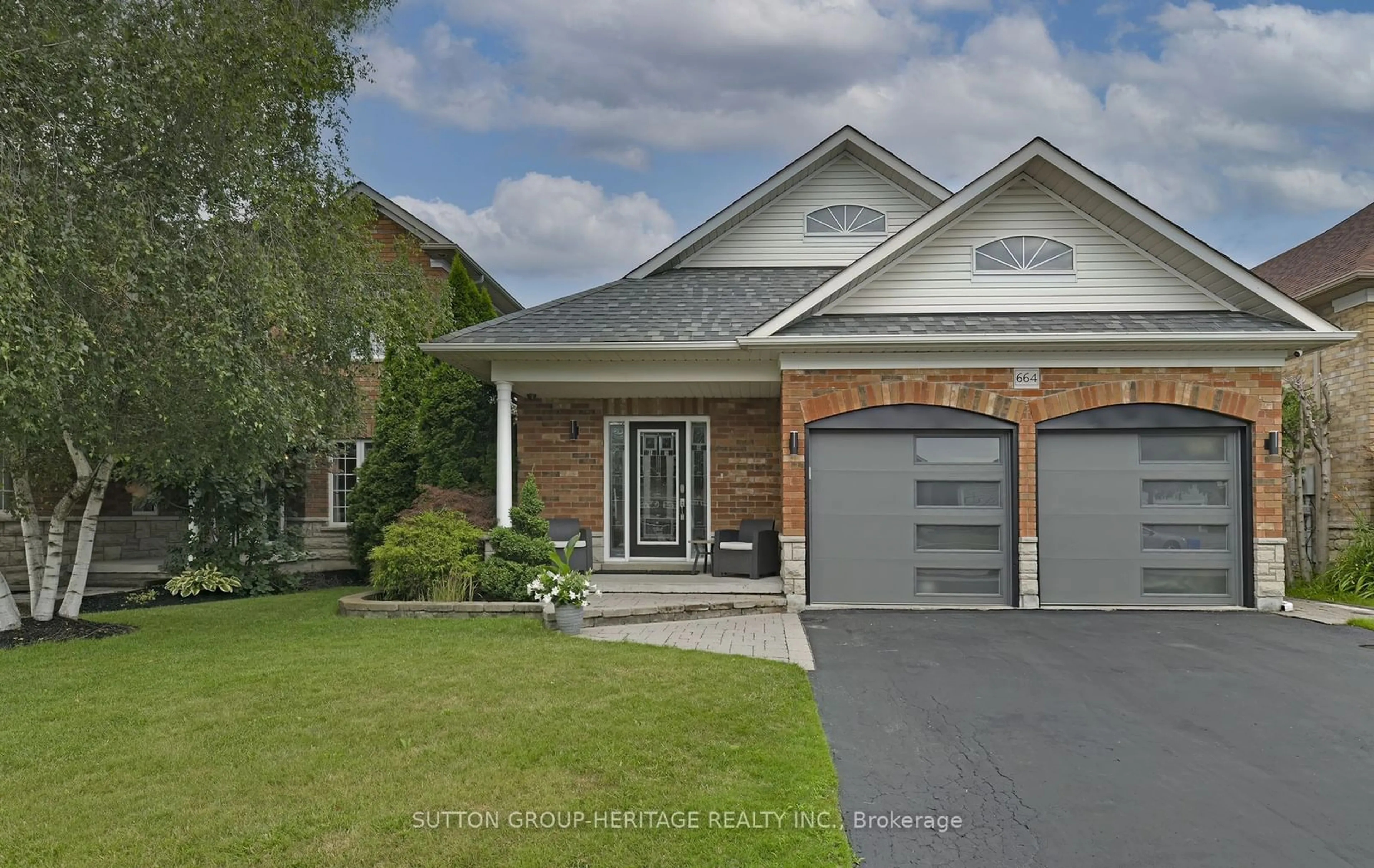 Frontside or backside of a home for 664 Ormond Dr, Oshawa Ontario L1K 2R9