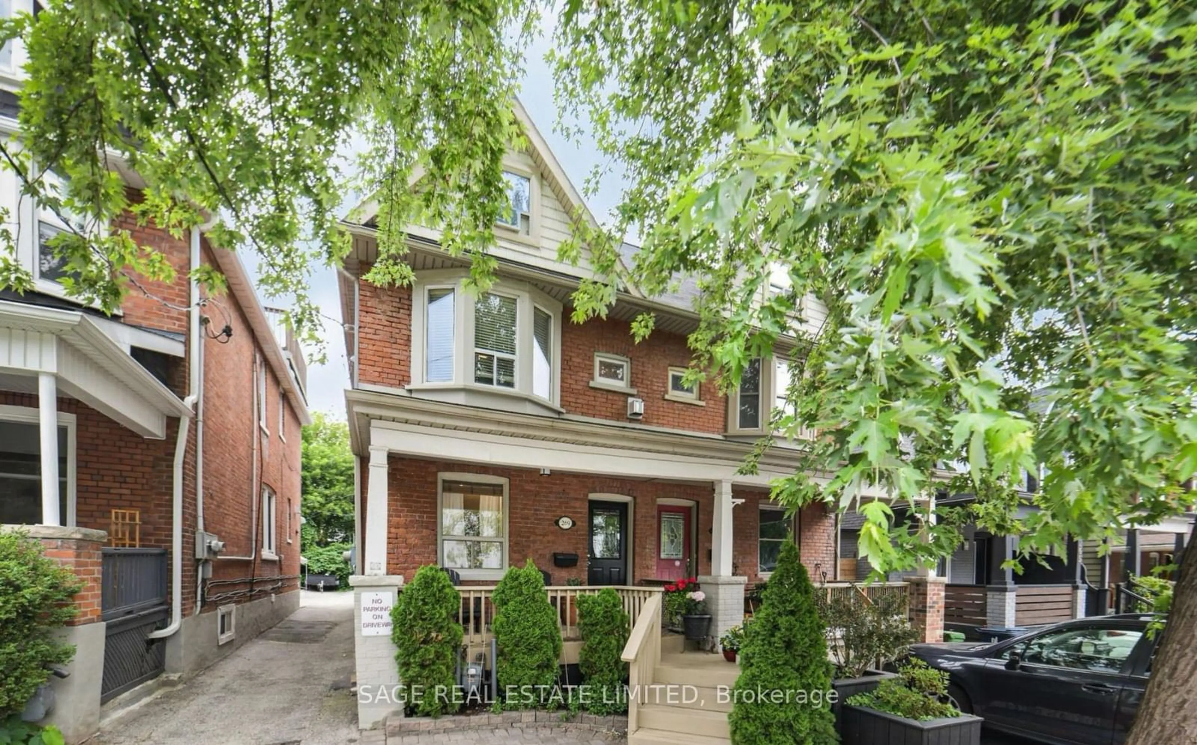 Home with brick exterior material for 269 Woodbine Ave, Toronto Ontario M4L 3P3