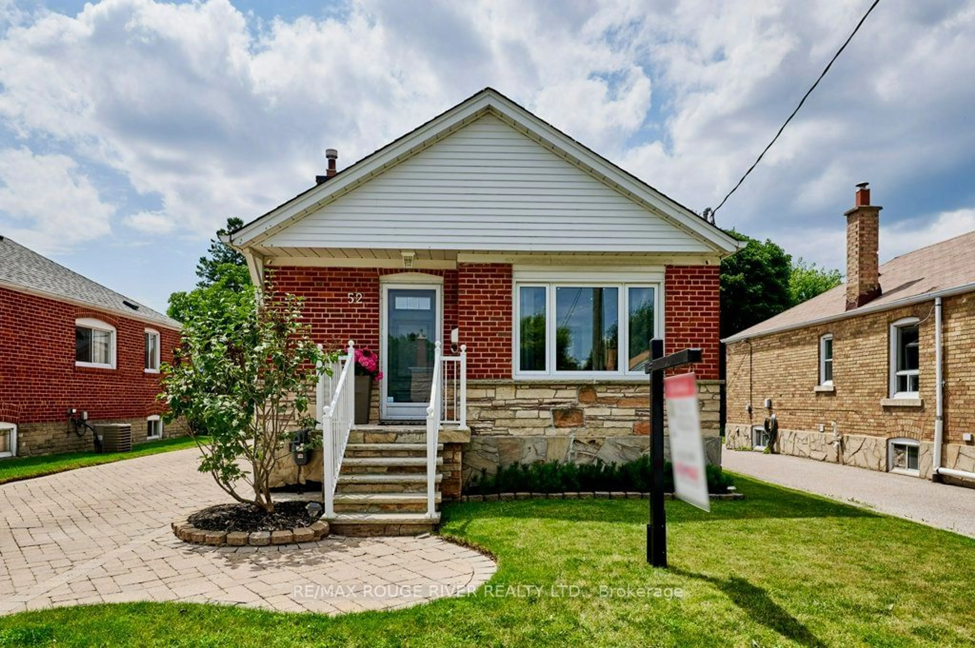 Home with brick exterior material for 52 Marsh Rd, Toronto Ontario M1K 1Y9