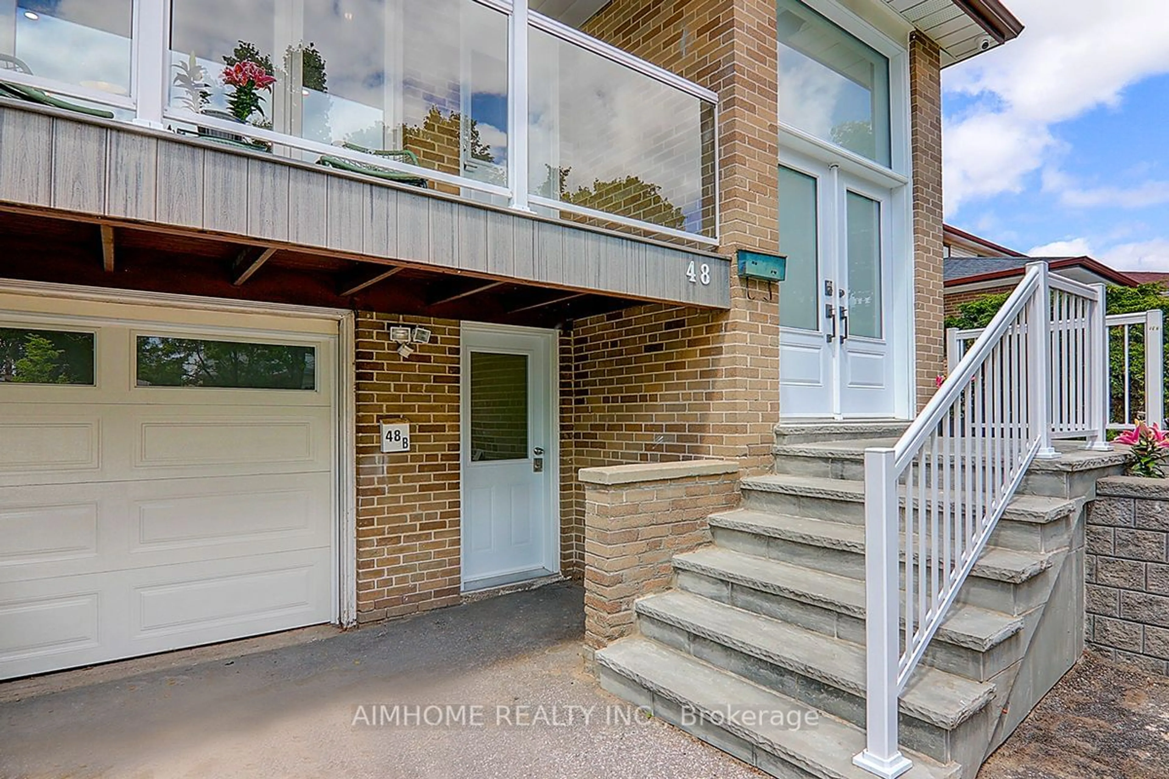 Home with brick exterior material for 48 Brigadoon Cres, Toronto Ontario M1T 3C1