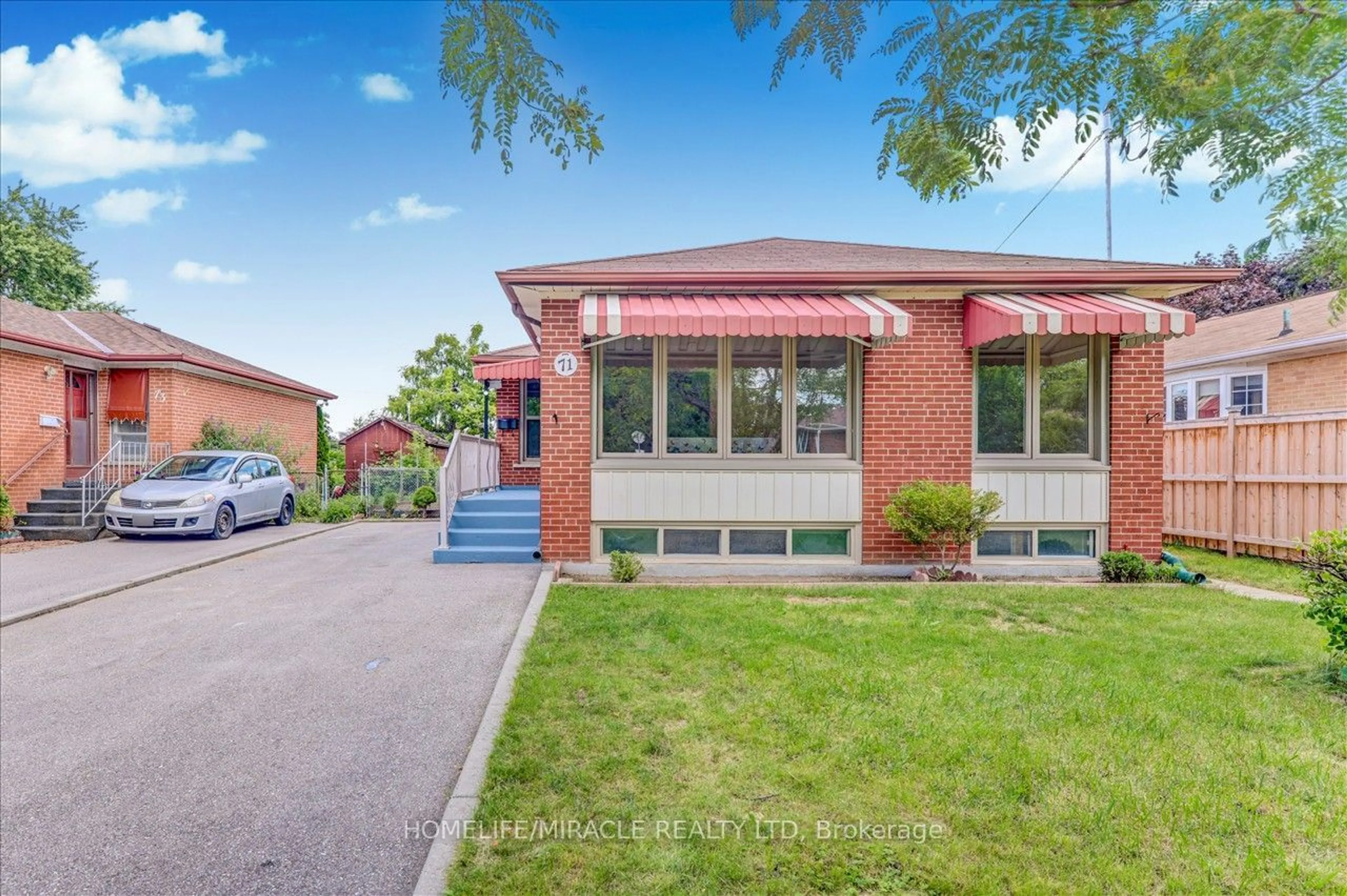 Home with brick exterior material for 71 Araman Dr, Toronto Ontario M1T 2P7