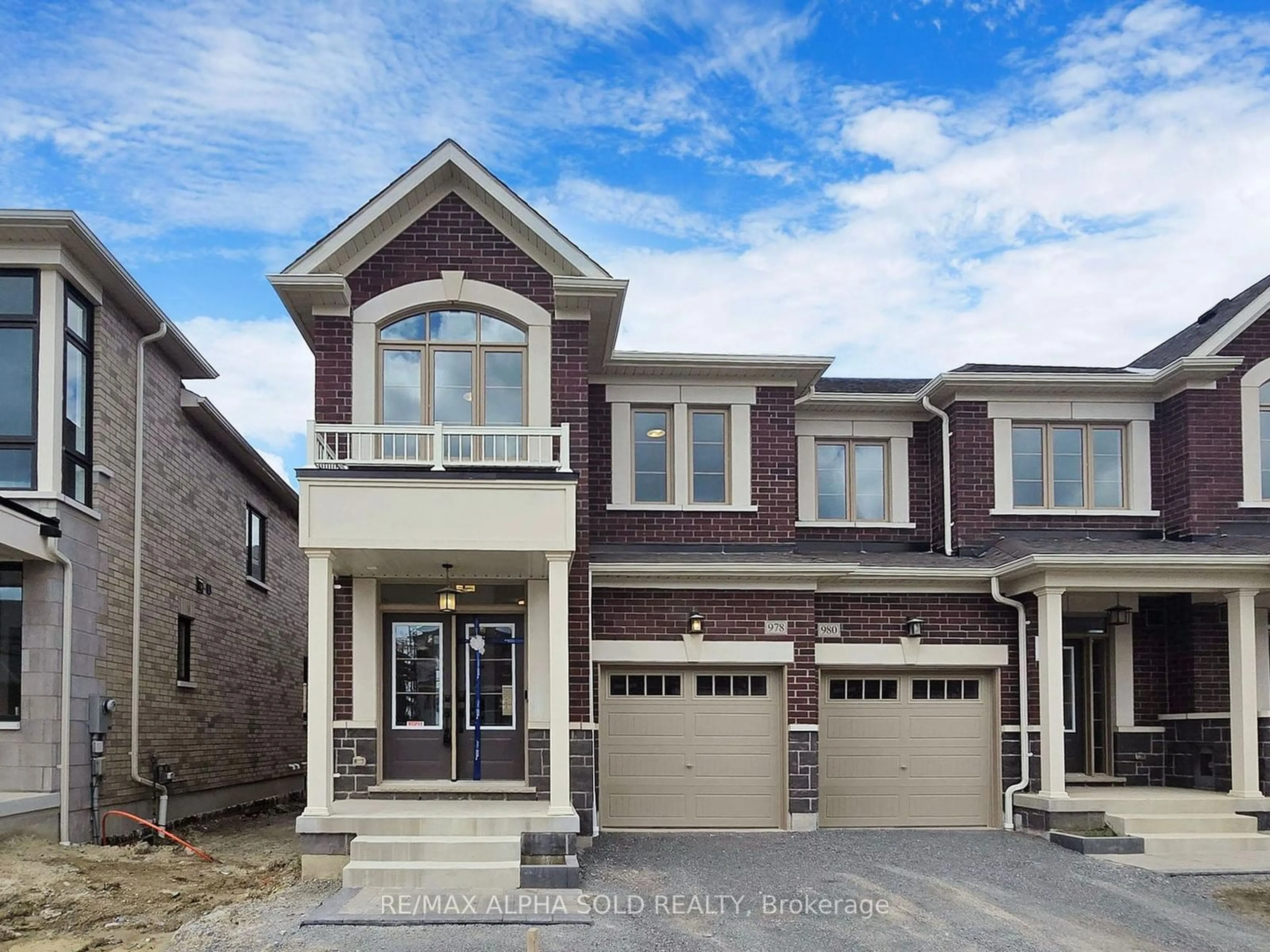 Home with brick exterior material for 978 CrowsNest Hollow Ave, Pickering Ontario L1X 0P4