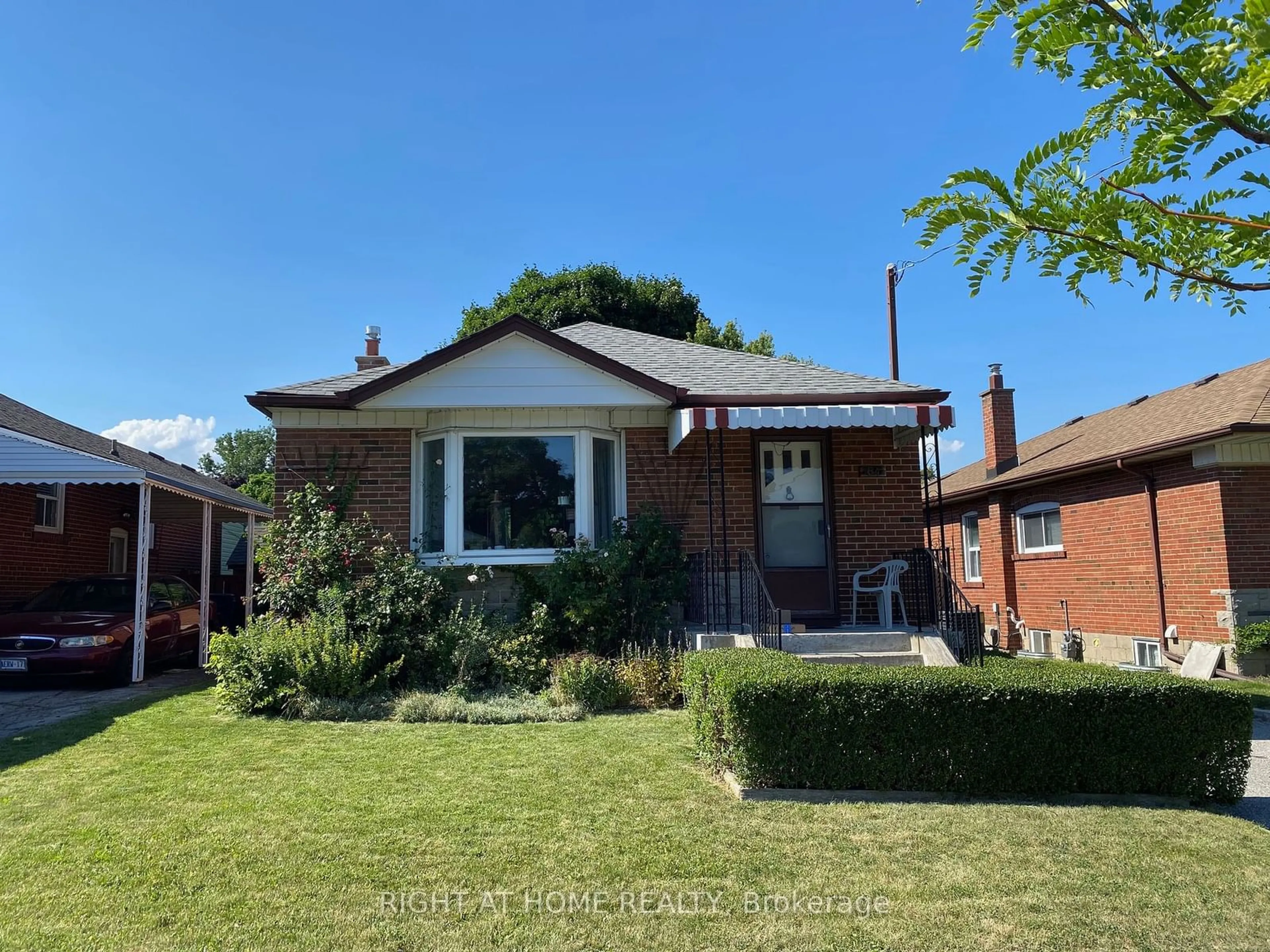 Frontside or backside of a home for 64 Exford Dr, Toronto Ontario M1P 1M3
