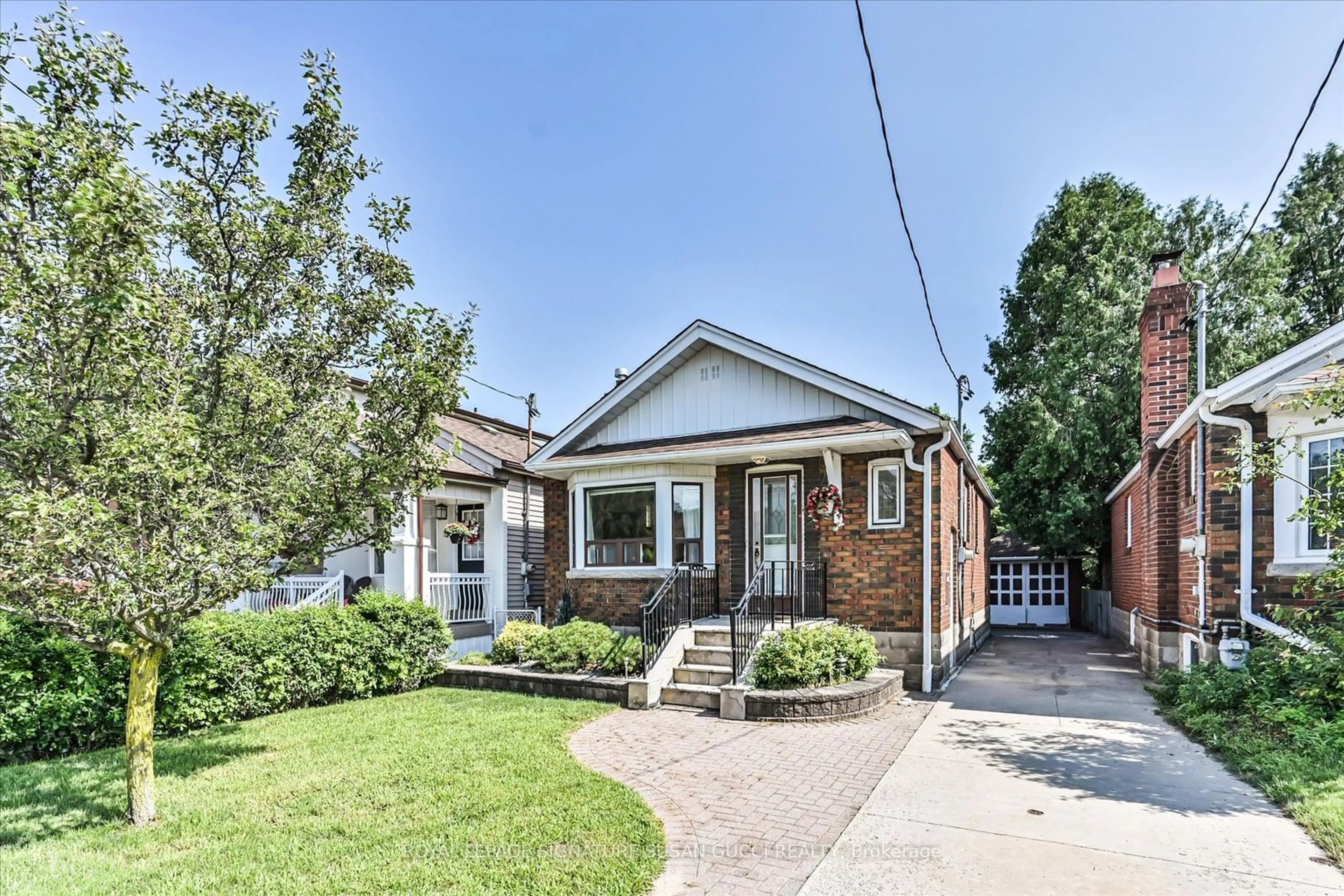 Home with brick exterior material for 175 Woodville Ave, Toronto Ontario M4J 2R4