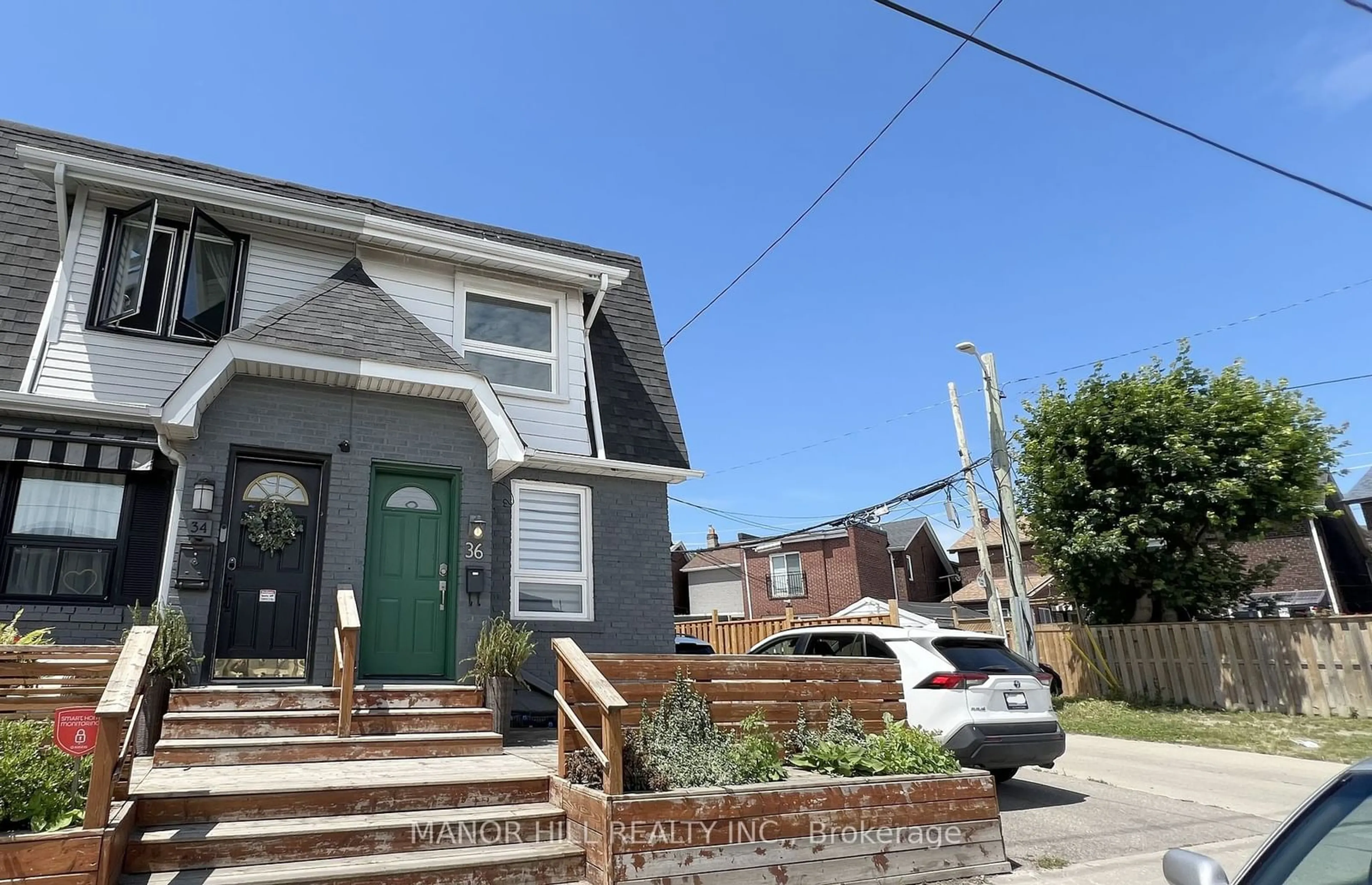Frontside or backside of a home for 36 Leslie St, Toronto Ontario M4M 3C4