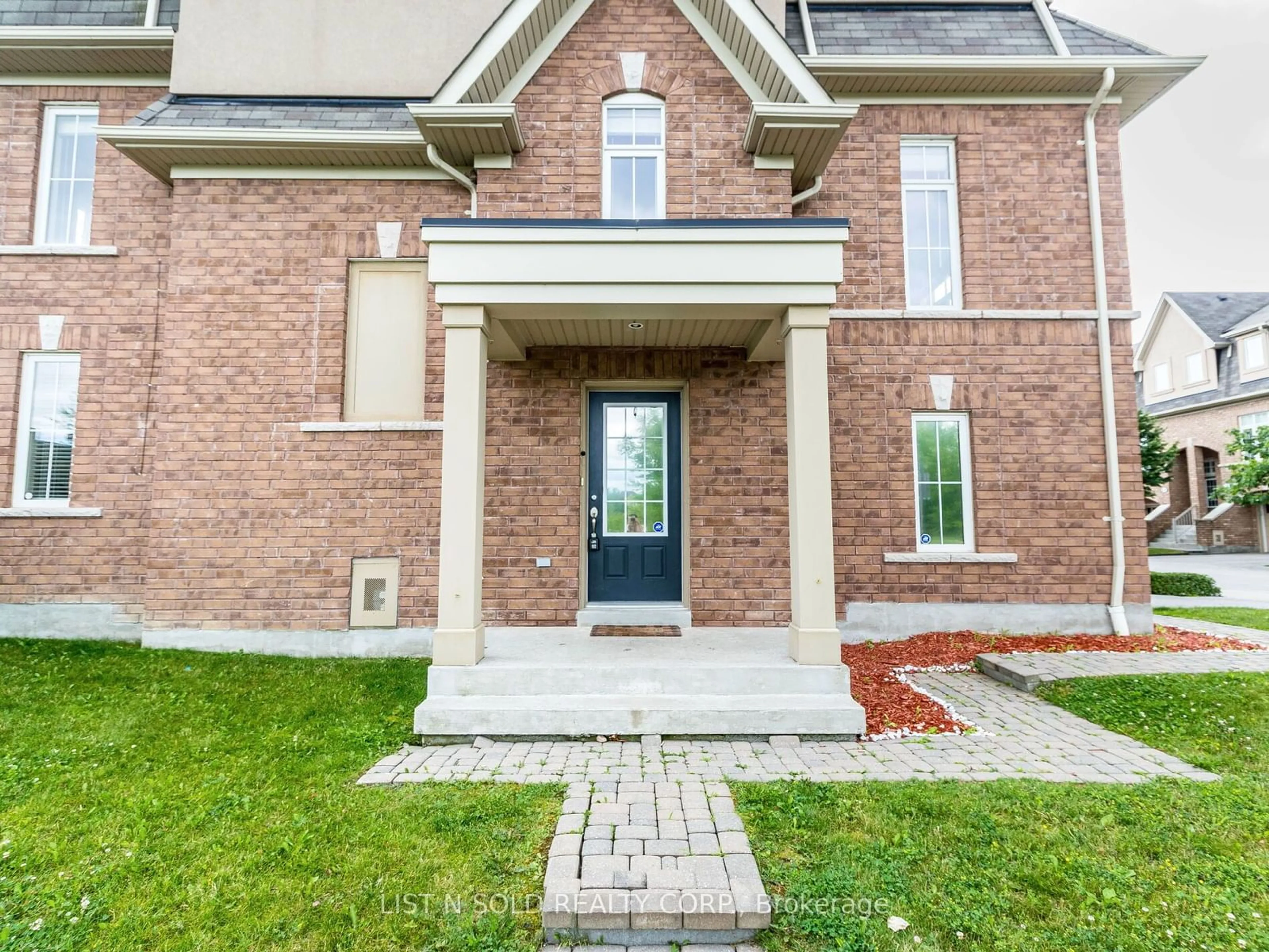 Home with brick exterior material for 1 Burtonbury Lane #61, Ajax Ontario L1Z 0C2