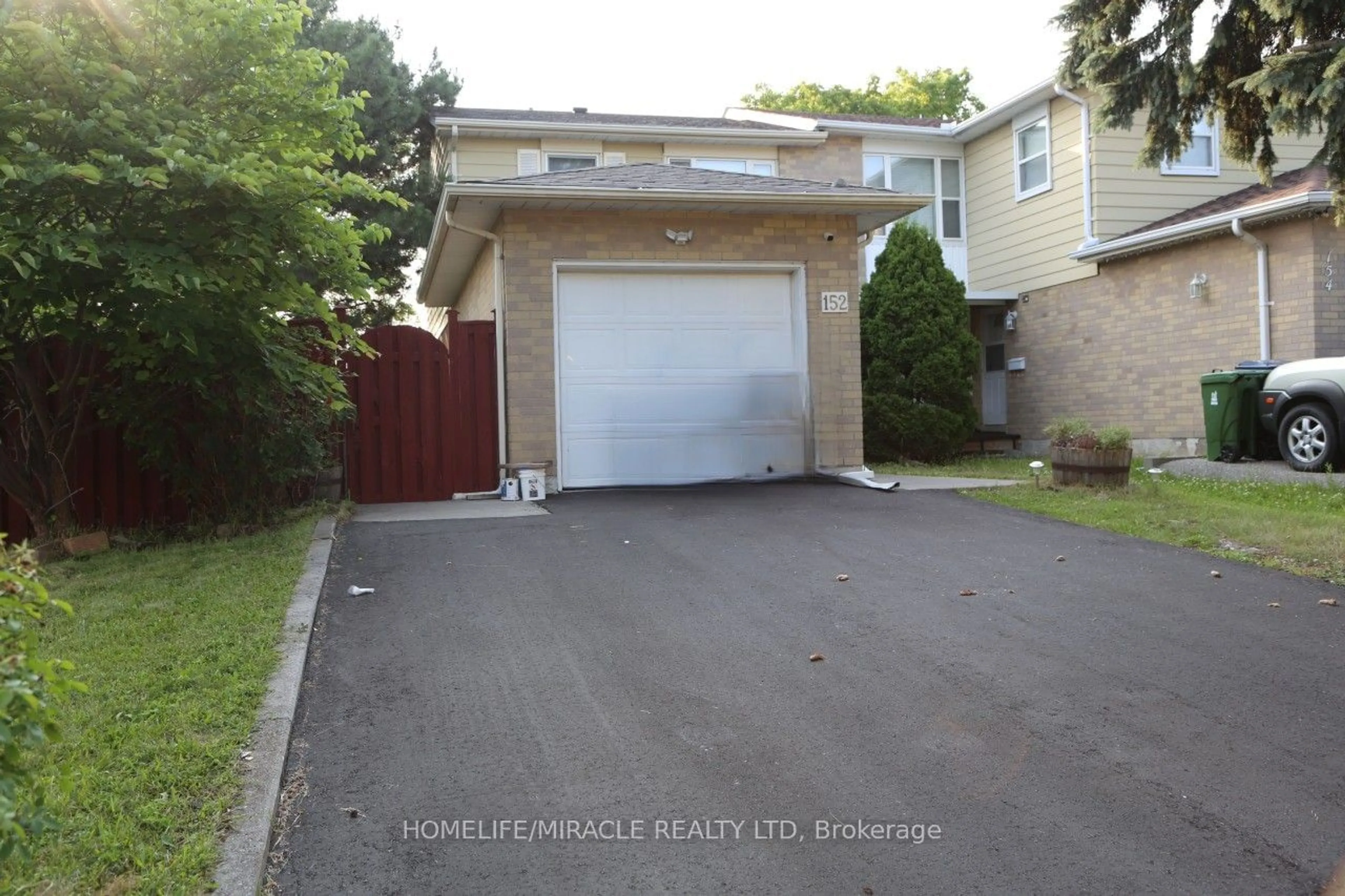 Frontside or backside of a home for 152 Mammoth Hall Tr, Toronto Ontario M1B 1R1