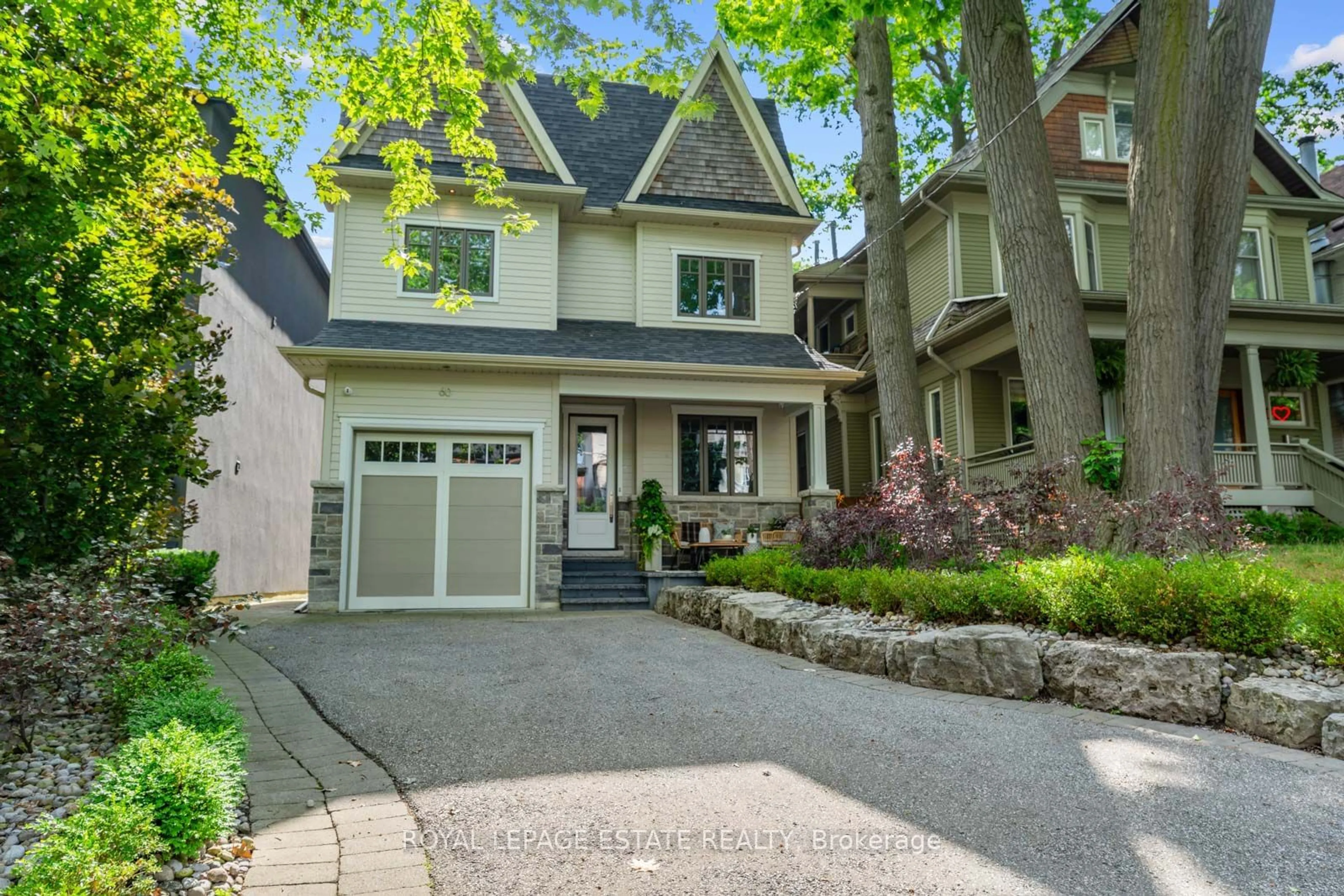 Frontside or backside of a home for 60 Waverley Rd, Toronto Ontario M4L 3T1