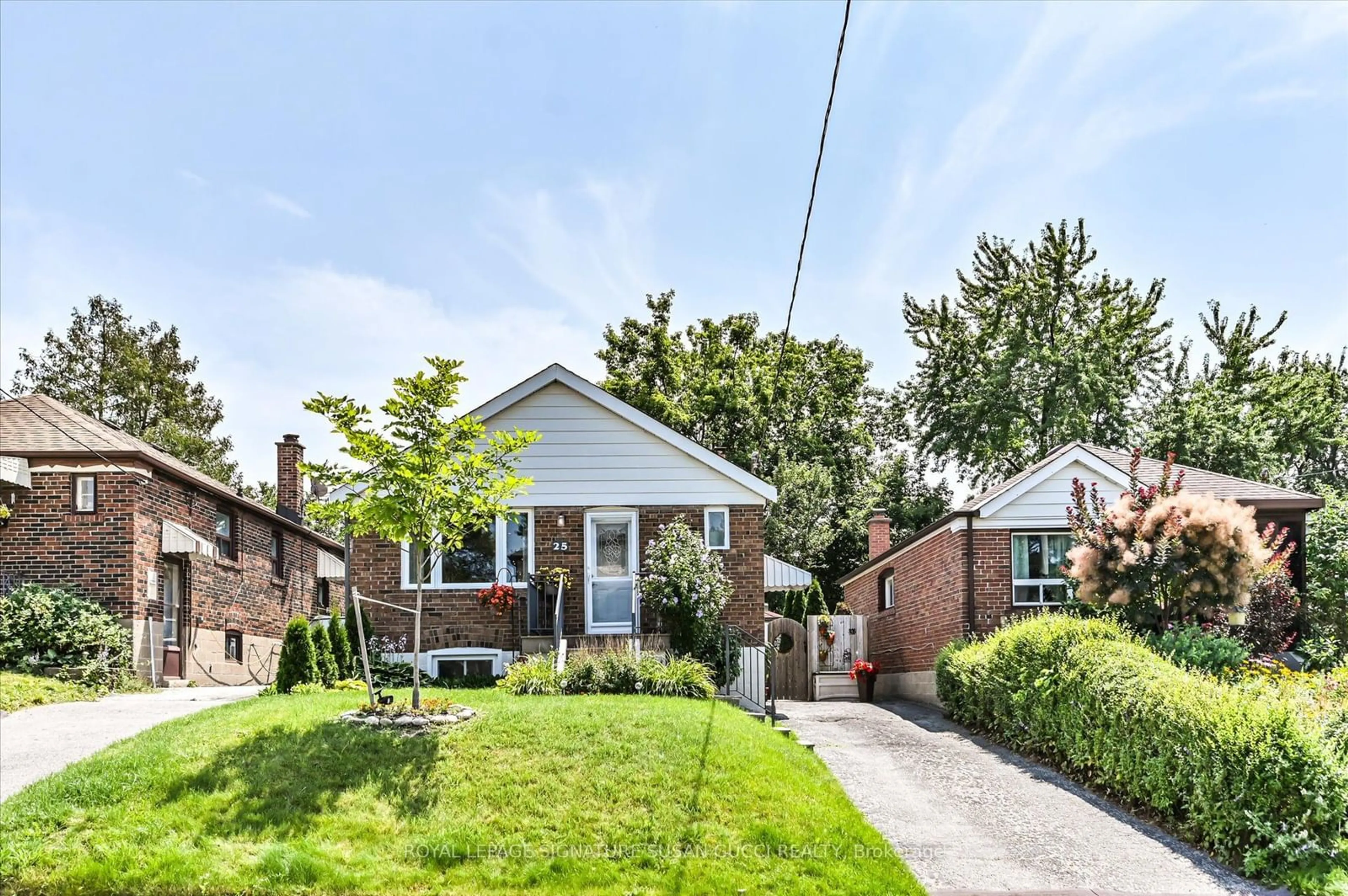 Frontside or backside of a home for 25 Galbraith Ave, Toronto Ontario M4B 2B4