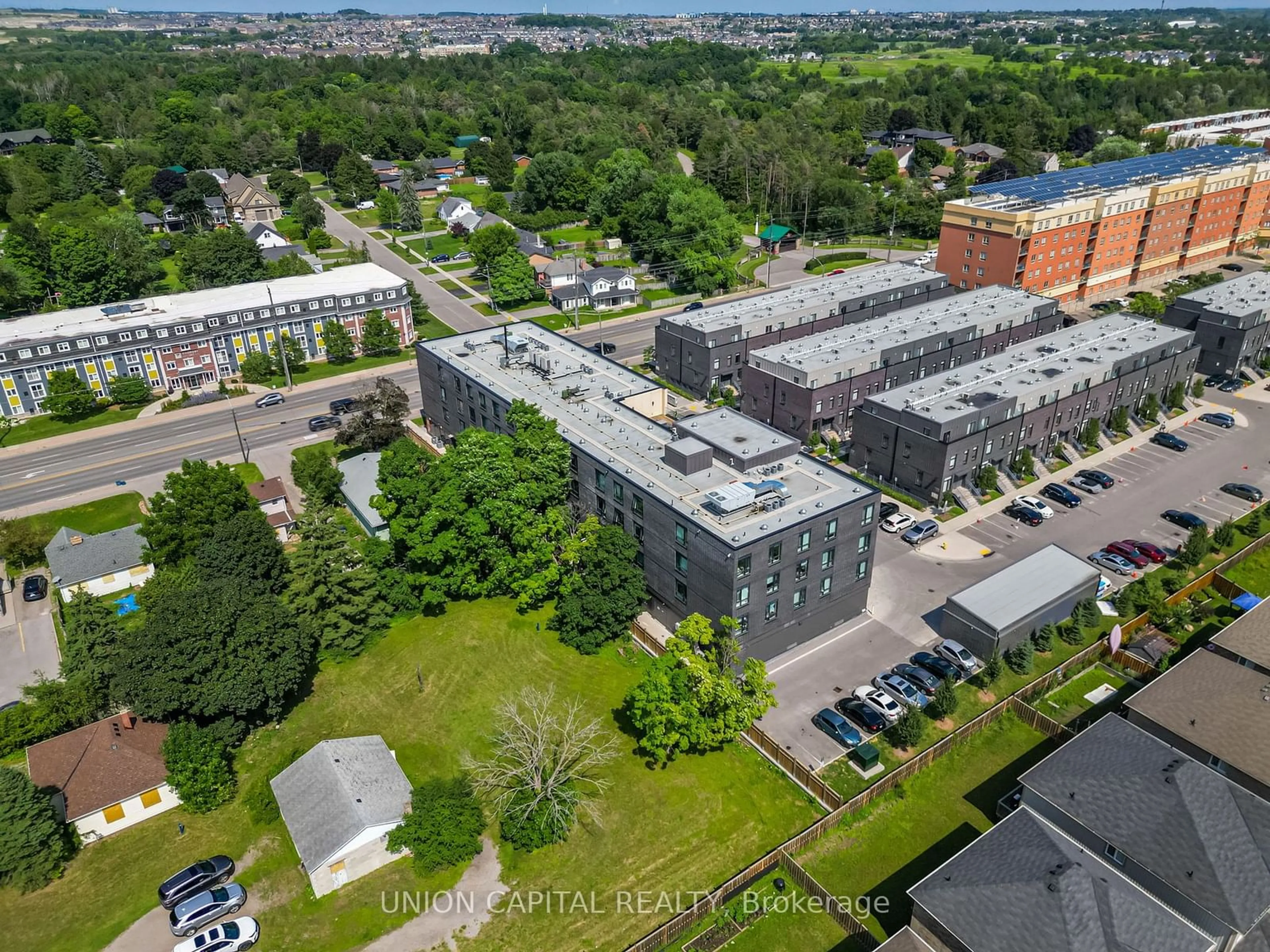 A pic from exterior of the house or condo for 1800 SIMCOE St #301, Oshawa Ontario L1G 4X9