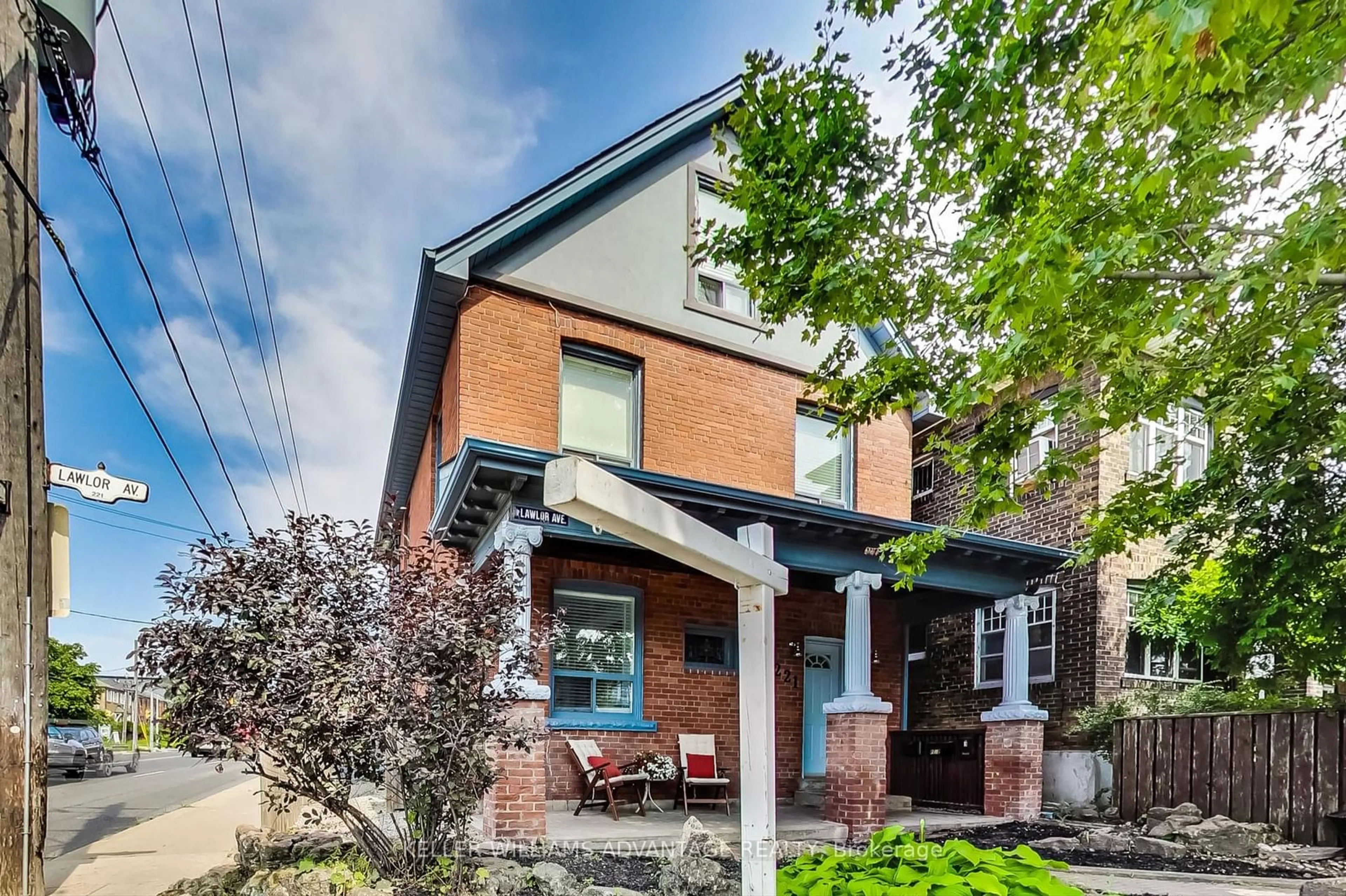 Home with brick exterior material for 221 Lawlor Ave, Toronto Ontario M4E 3L9