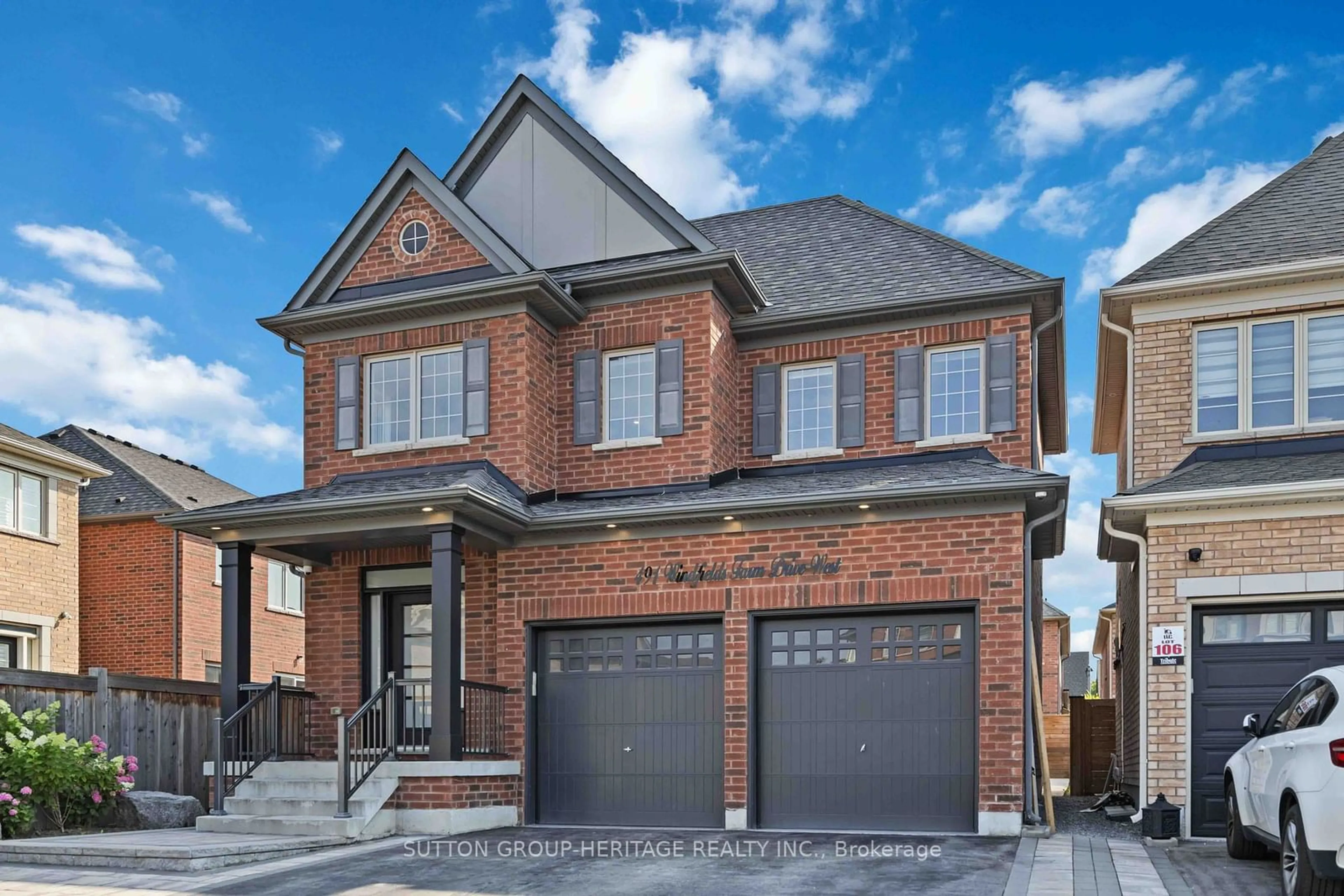 Home with brick exterior material for 491 Windfields Farm Dr, Oshawa Ontario L1H 7K4