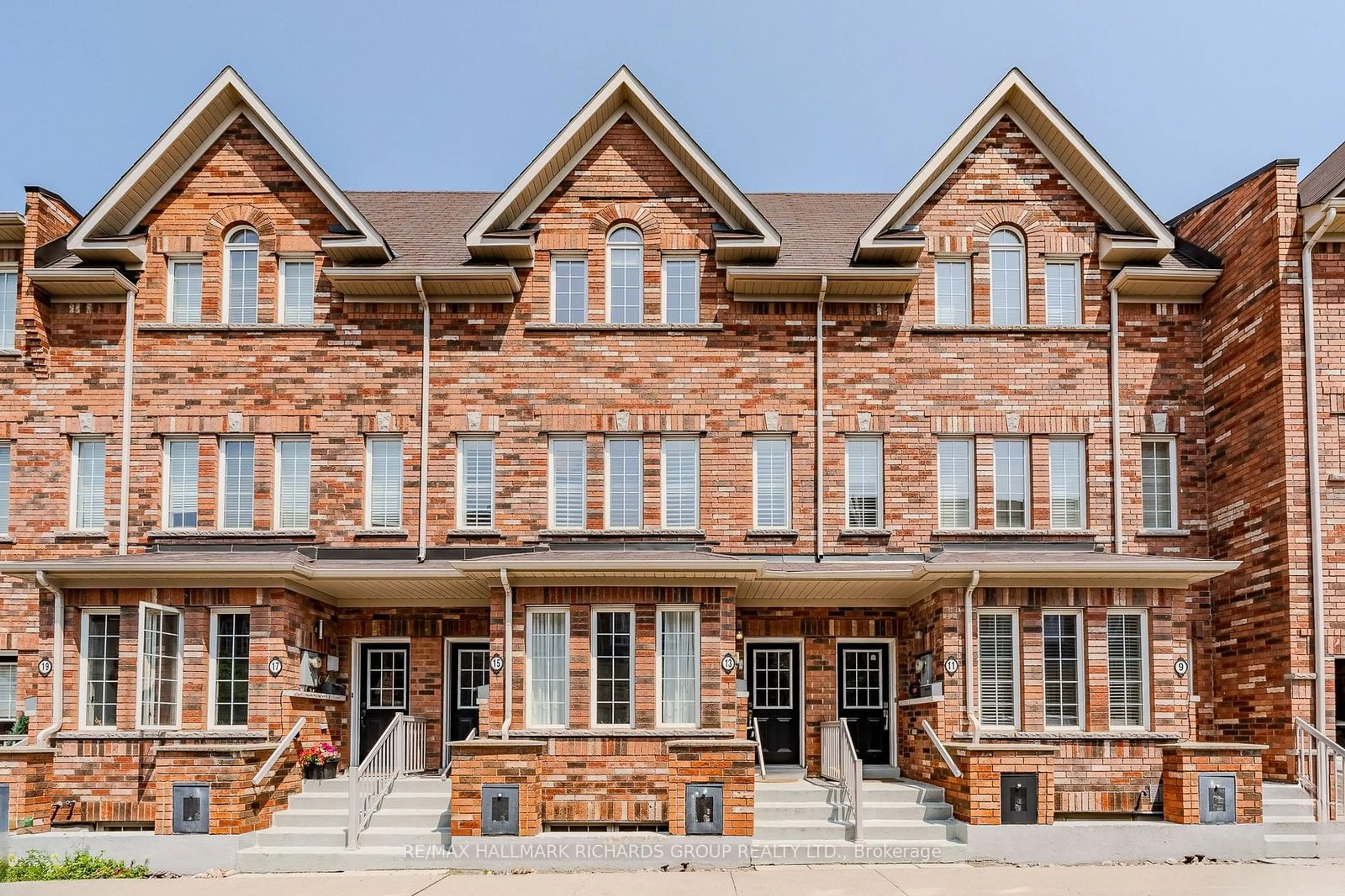 Home with brick exterior material for 13 Carnahan Terr, Toronto Ontario M4E 0B1