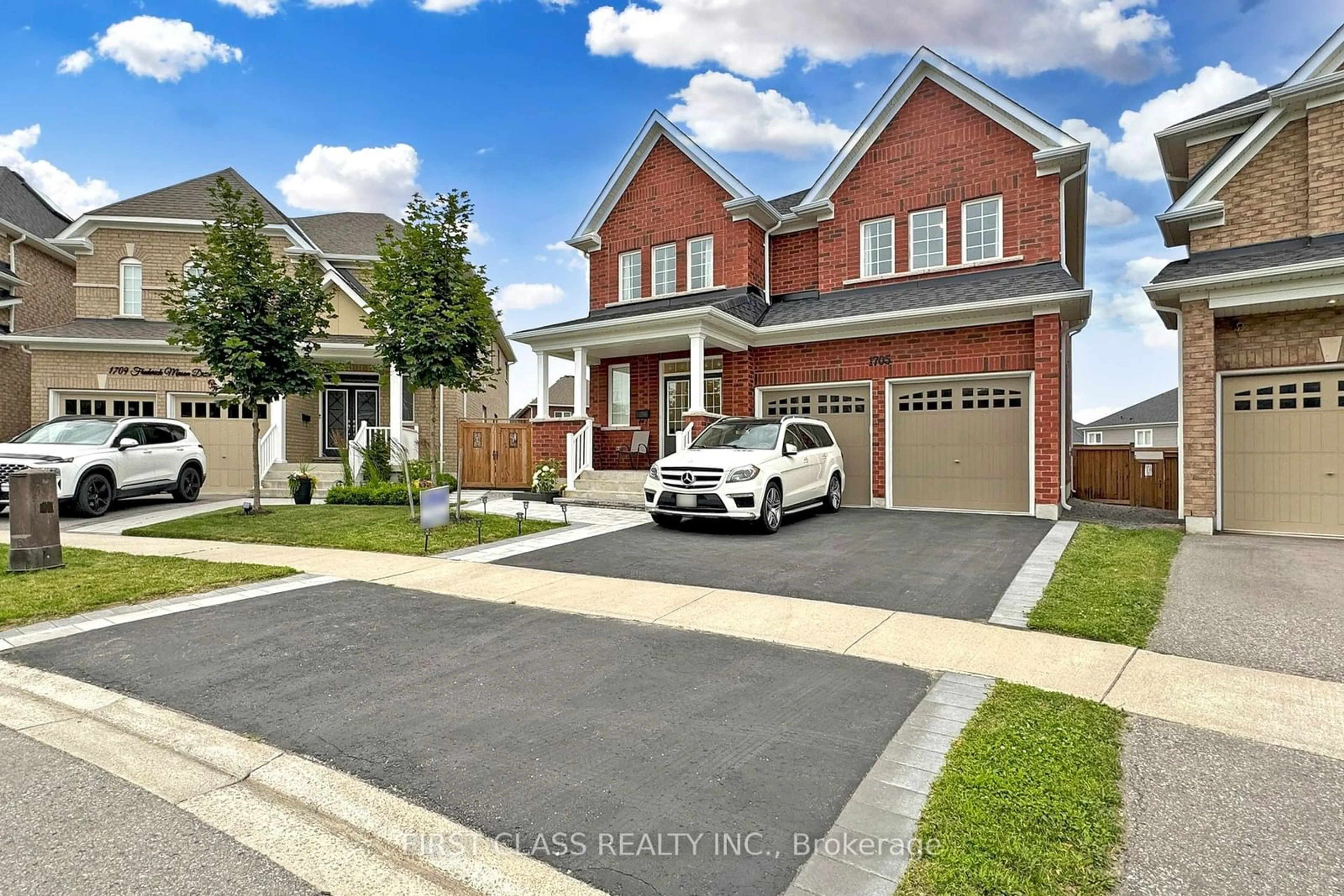 Frontside or backside of a home for 1705 Frederick Mason Dr, Oshawa Ontario L1K 0X5