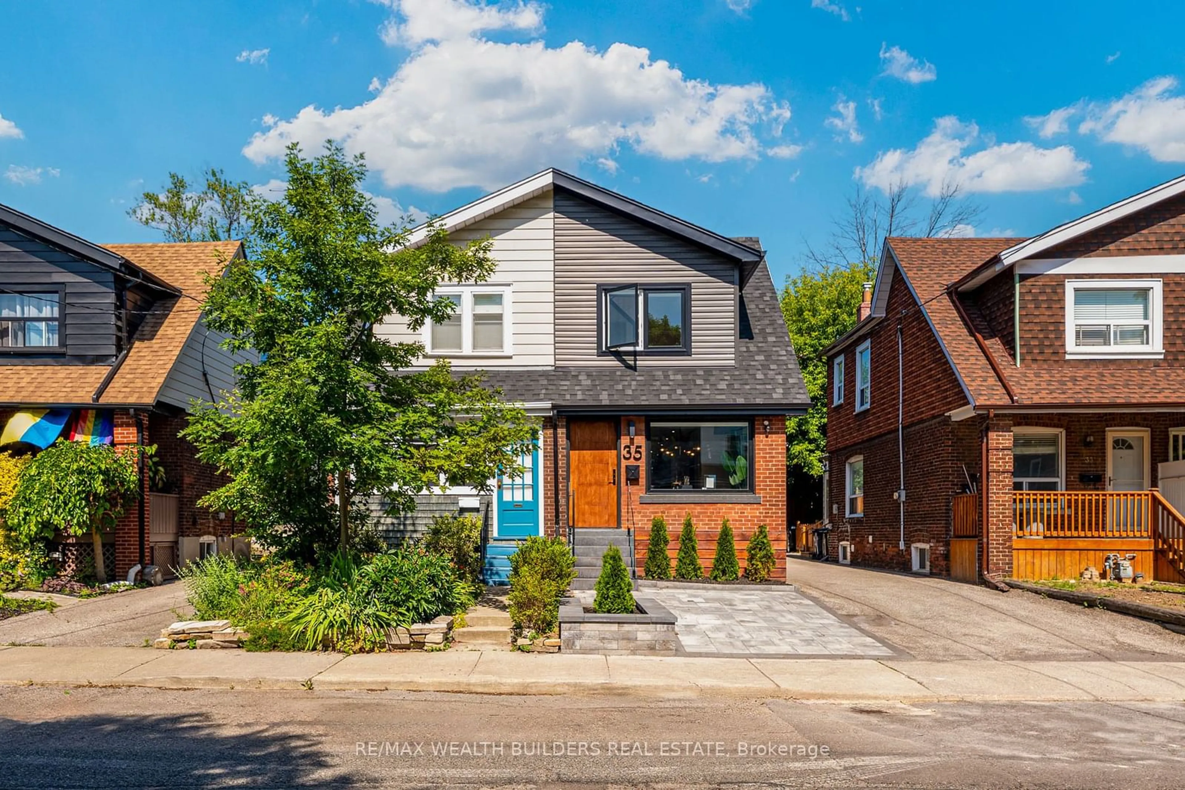 Home with brick exterior material for 35 Hiltz Ave, Toronto Ontario M4L 2N6