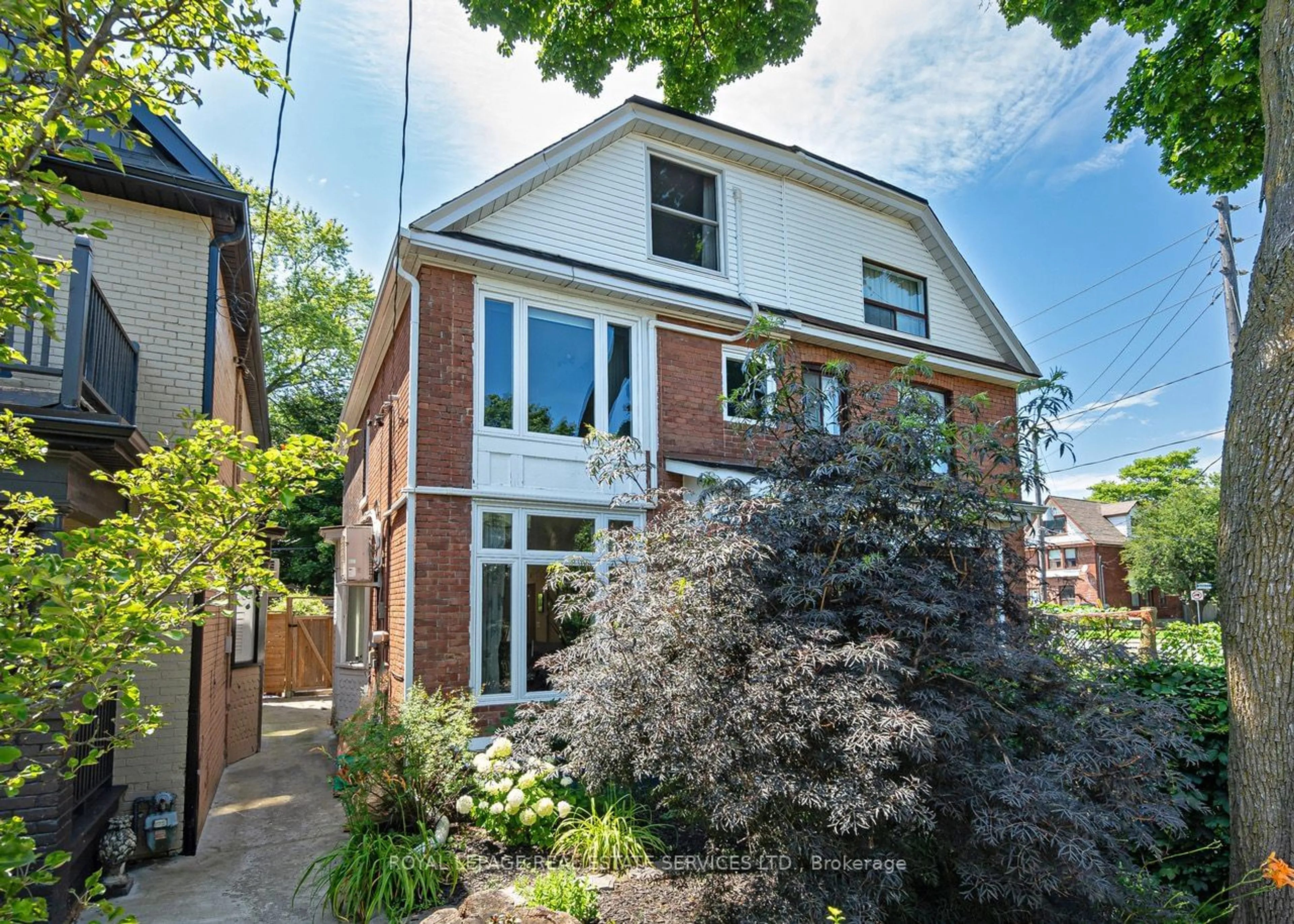 Home with brick exterior material for 132 Bertmount Ave, Toronto Ontario M4M 2X9