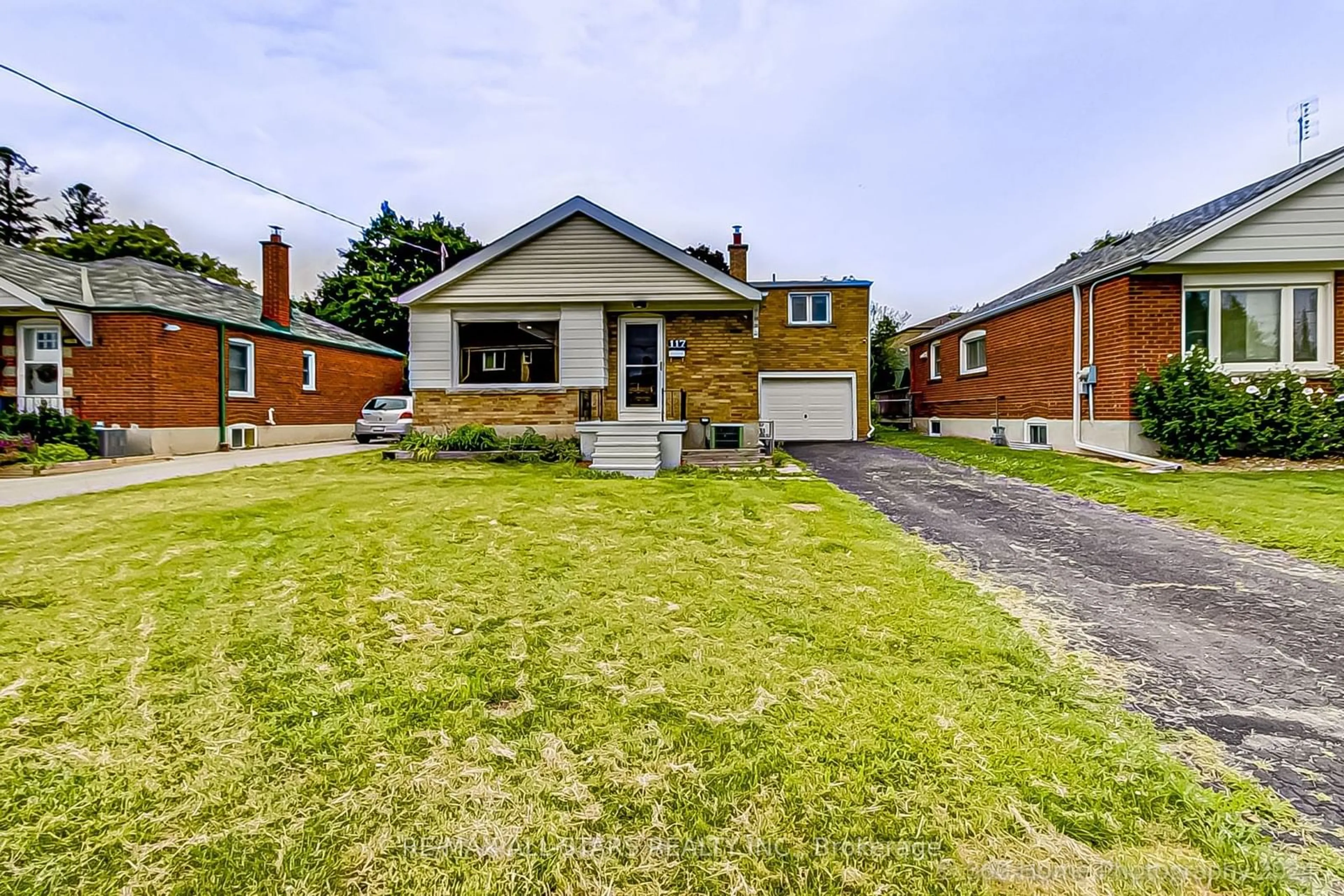 Frontside or backside of a home, the street view for 117 NORTH BONNINGTON Ave, Toronto Ontario M1K 1X8