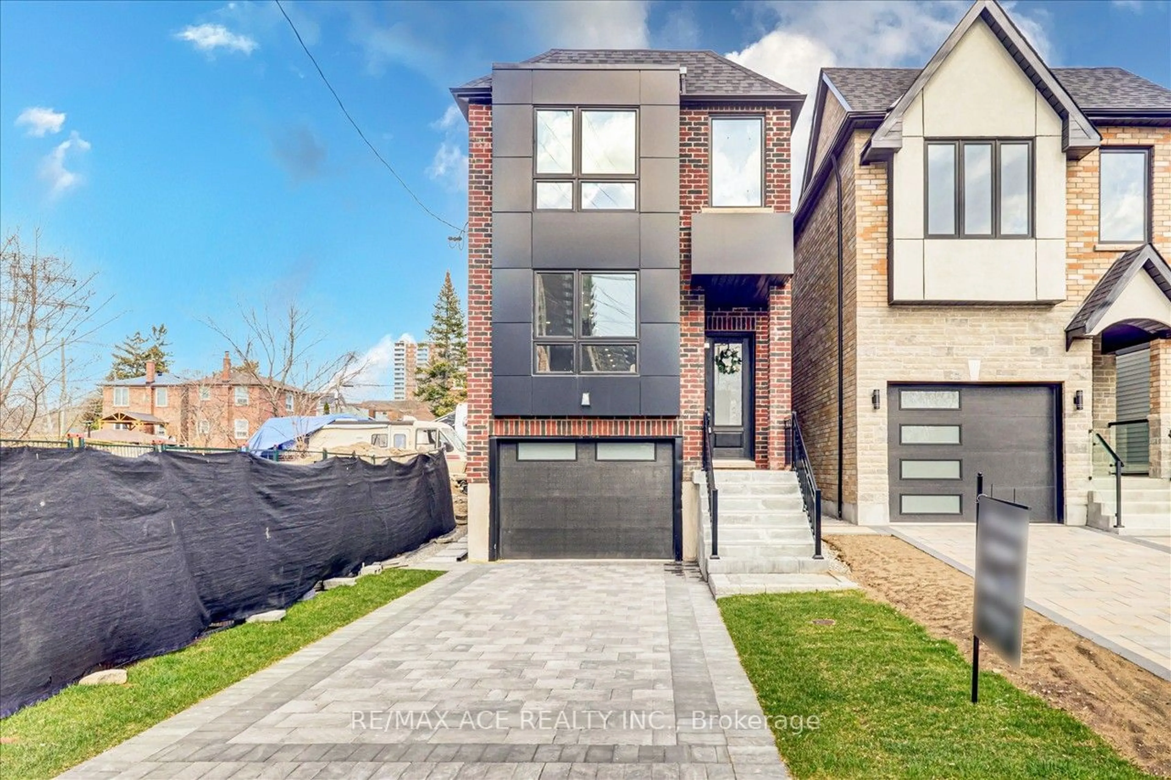 Home with brick exterior material for 167 August Ave, Toronto Ontario M1L 3N3