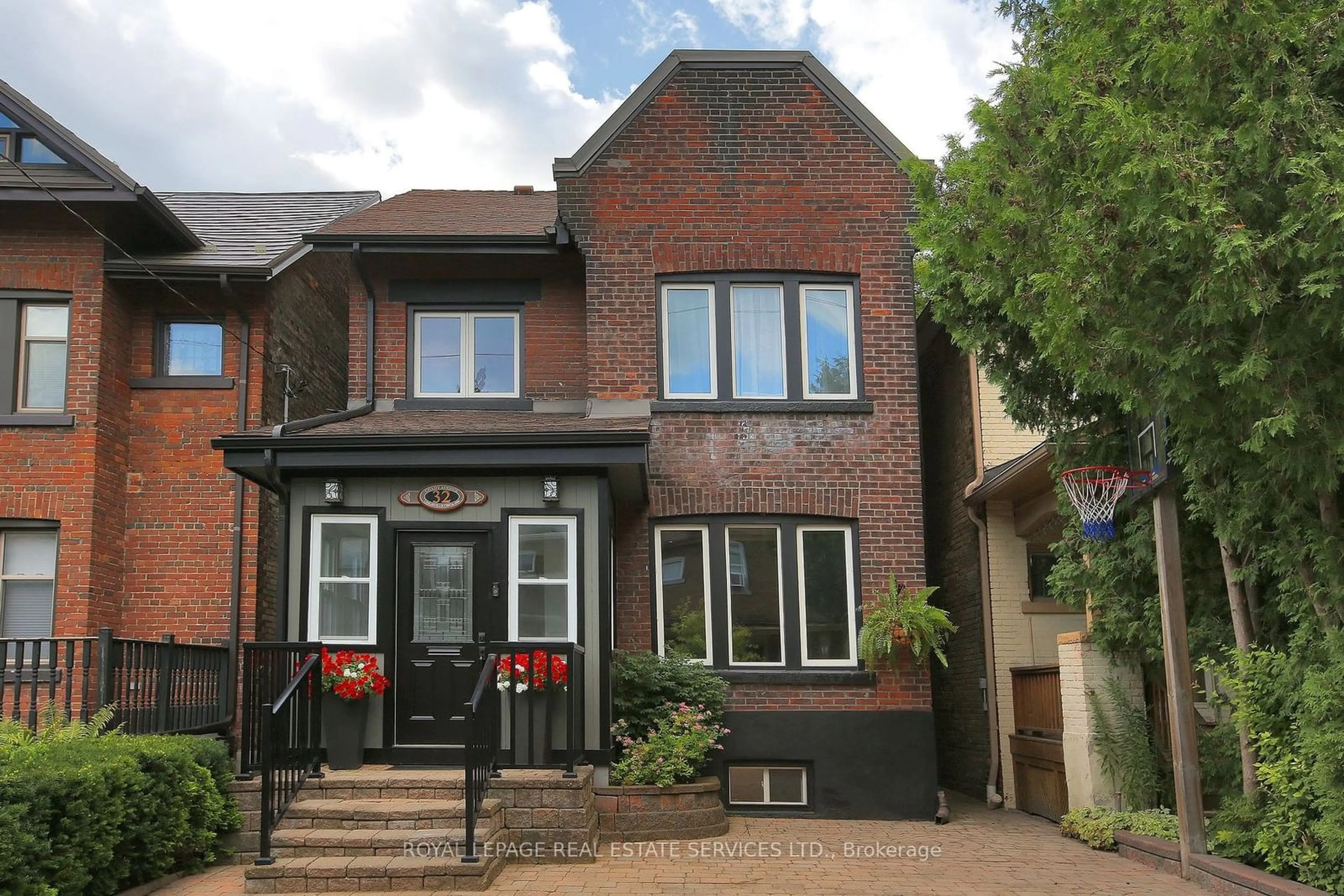 Home with brick exterior material for 32 Coady Ave, Toronto Ontario M4M 2Y8