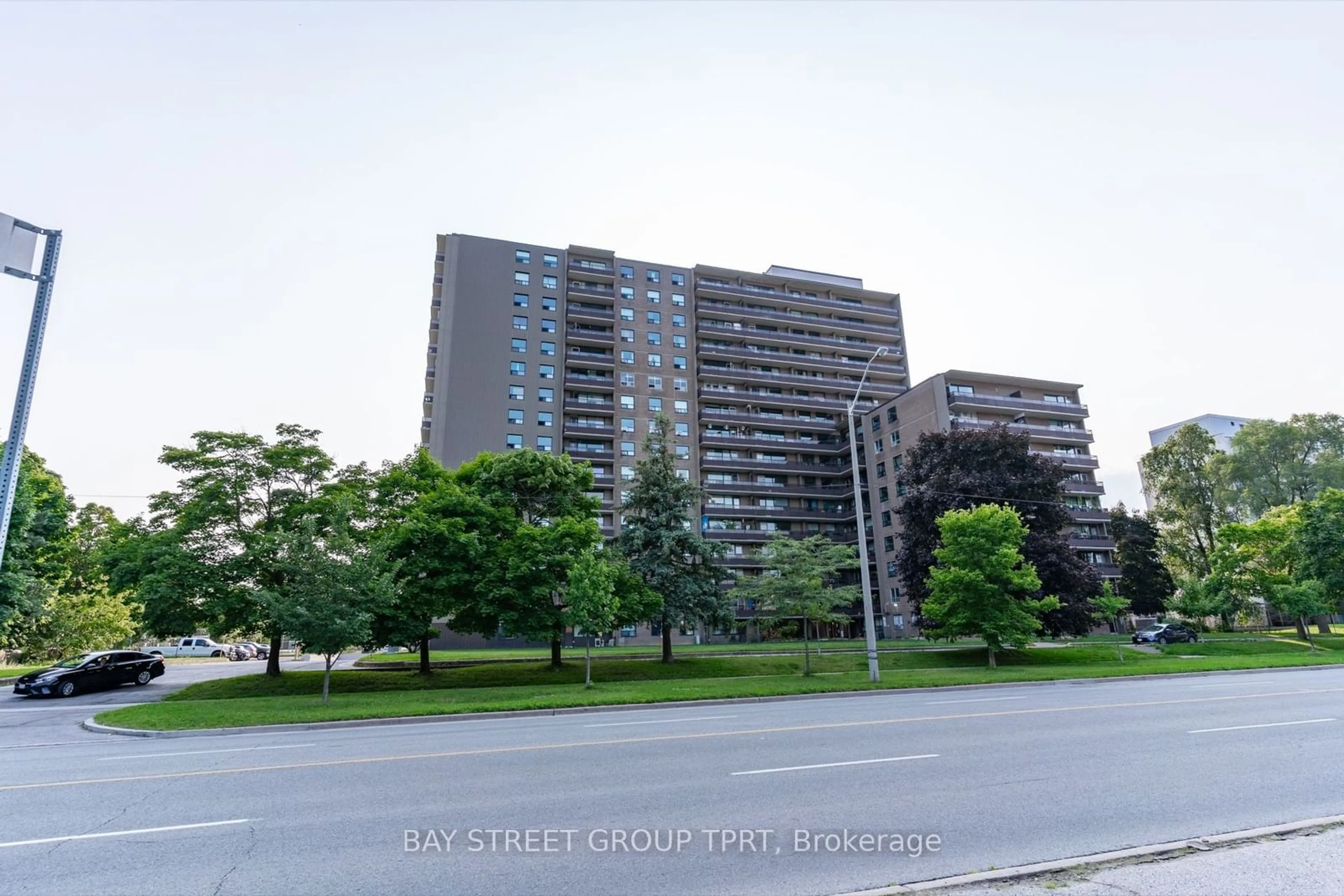 A pic from exterior of the house or condo for 180 Markham Rd #207, Toronto Ontario M1M 2Z9