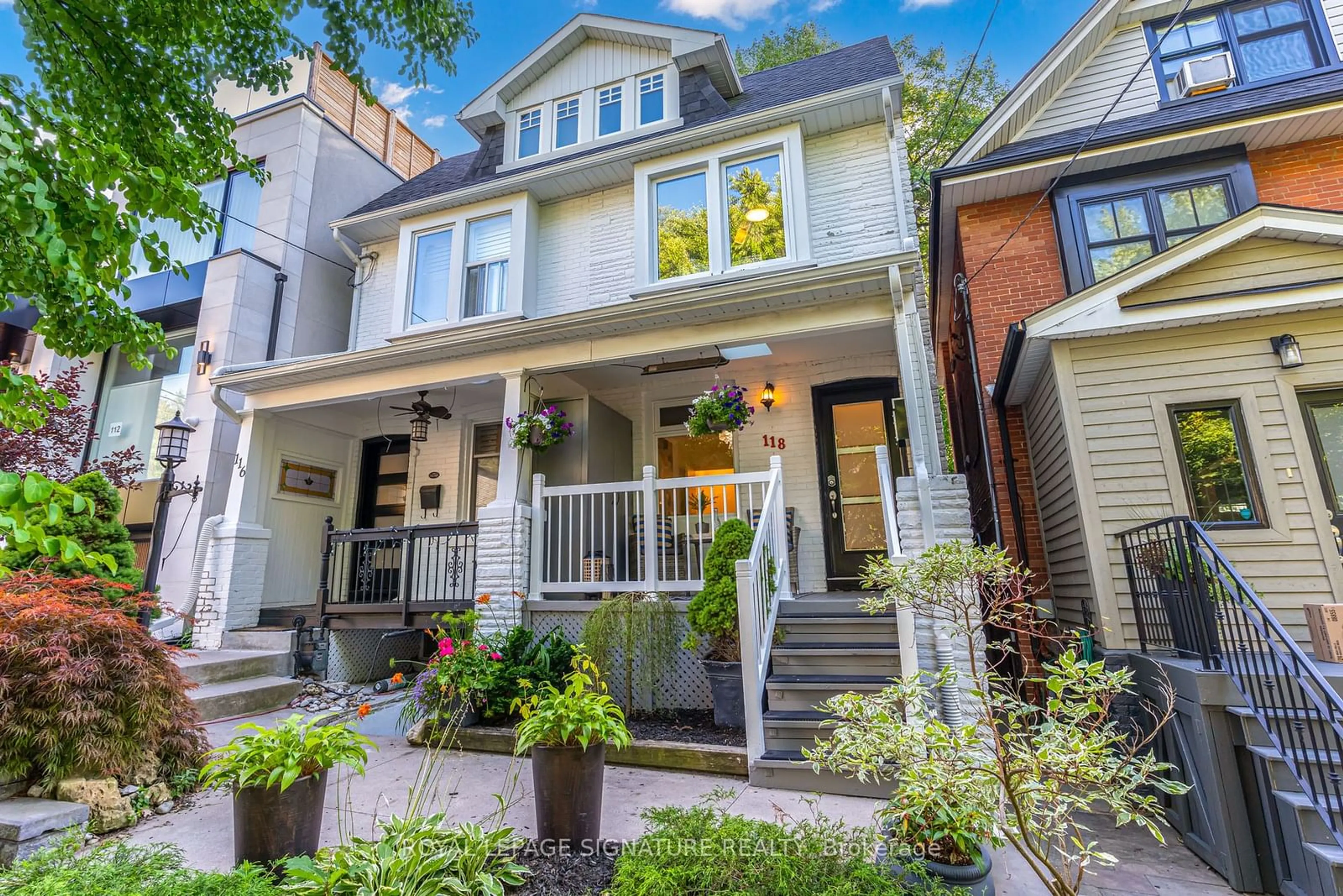 Home with brick exterior material for 118 Wheeler Ave, Toronto Ontario M4L 3V2