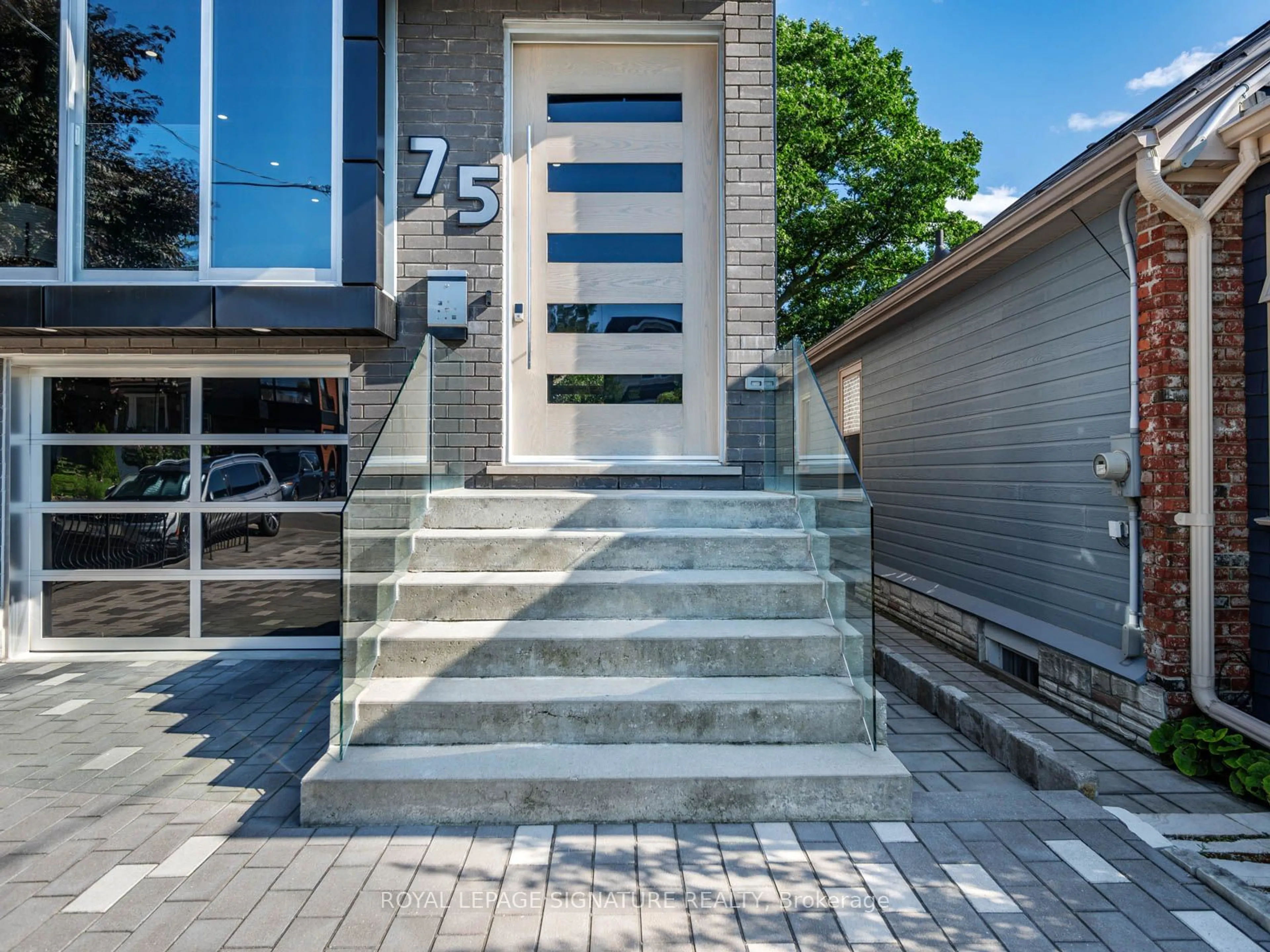 Home with brick exterior material for 75 Holborne Ave, Toronto Ontario M4C 2R2