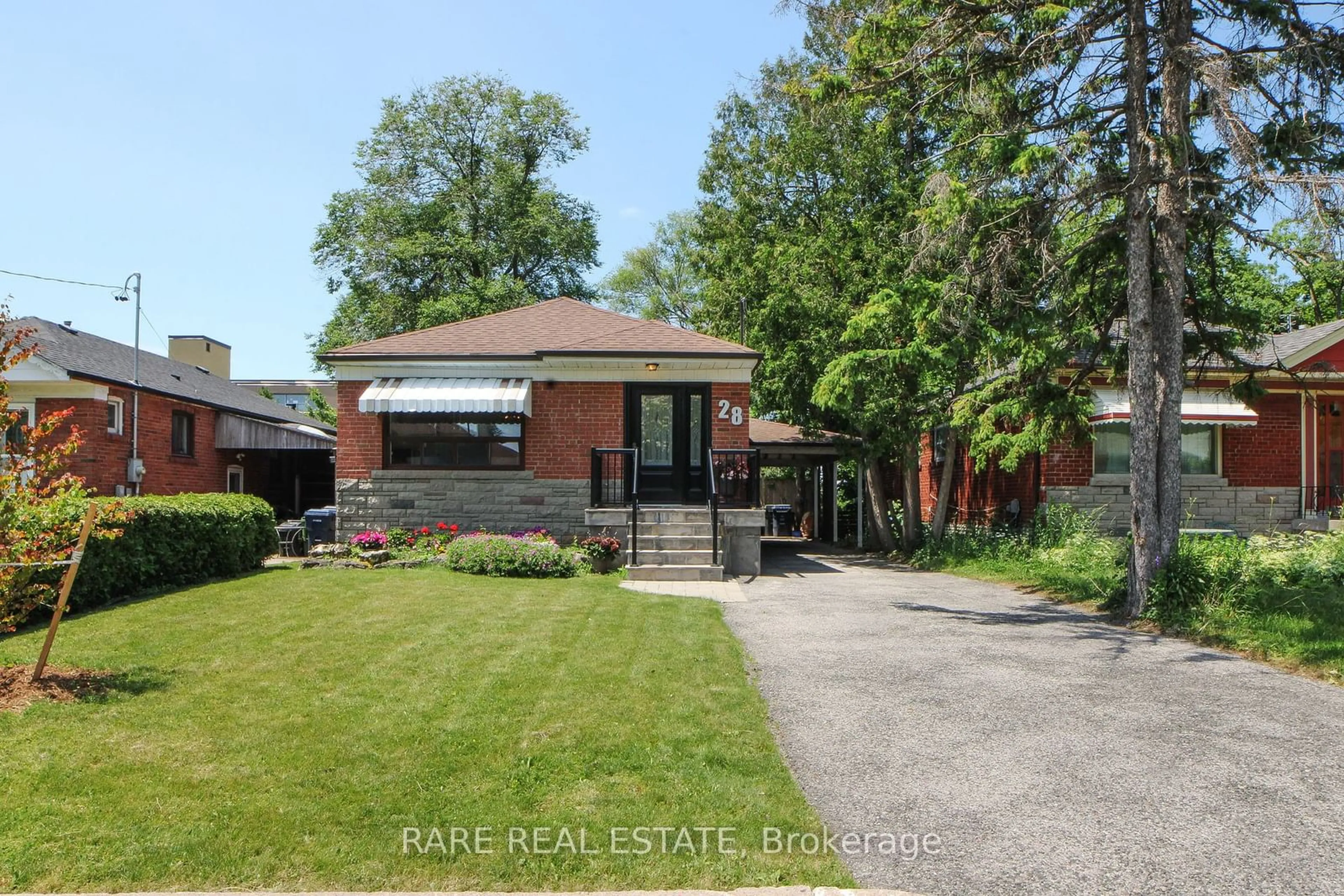 Frontside or backside of a home for 28 Burnley Ave, Toronto Ontario M1R 2M4