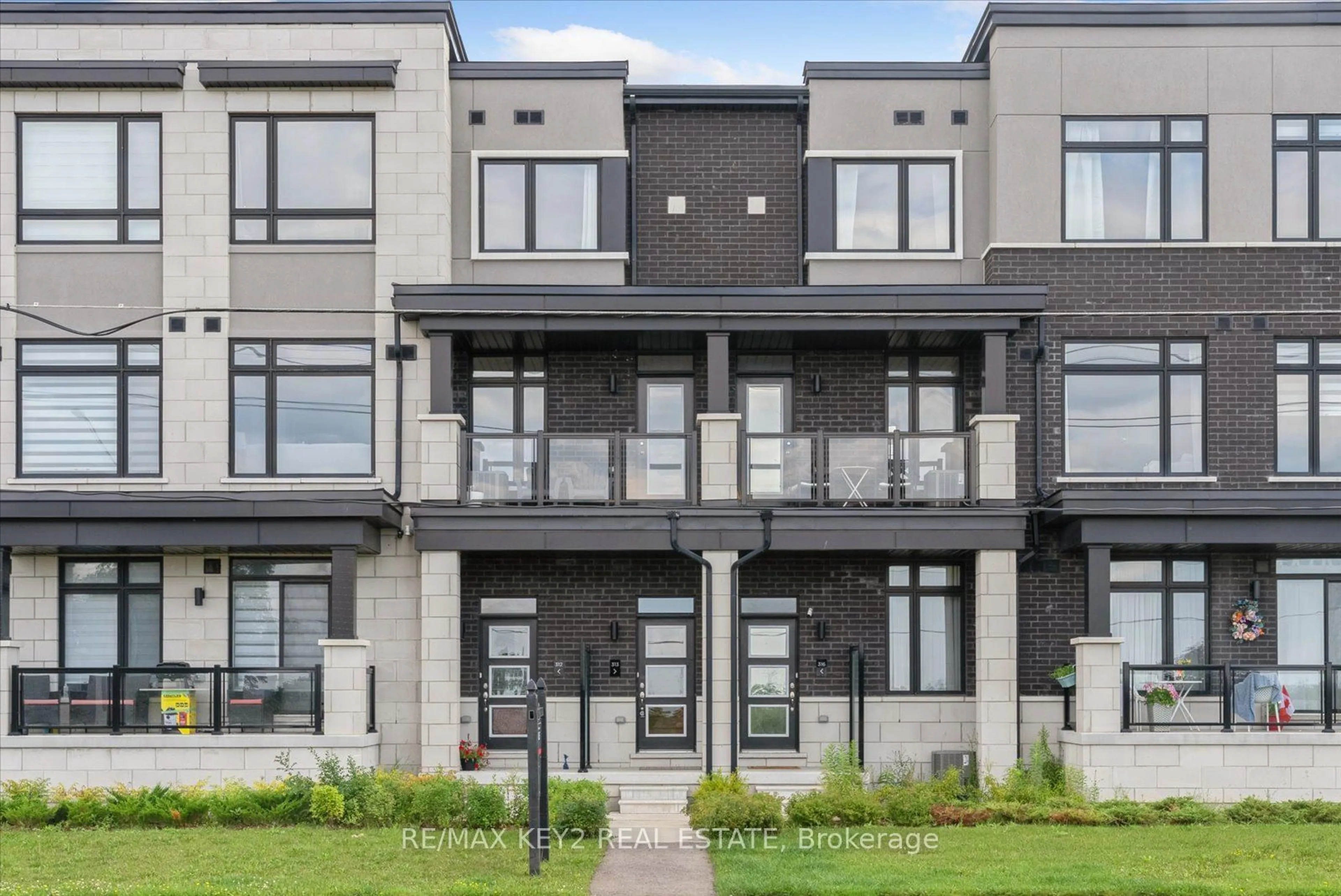 A pic from exterior of the house or condo for 2550 Castlegate Crossing #313, Pickering Ontario L1X 0H6