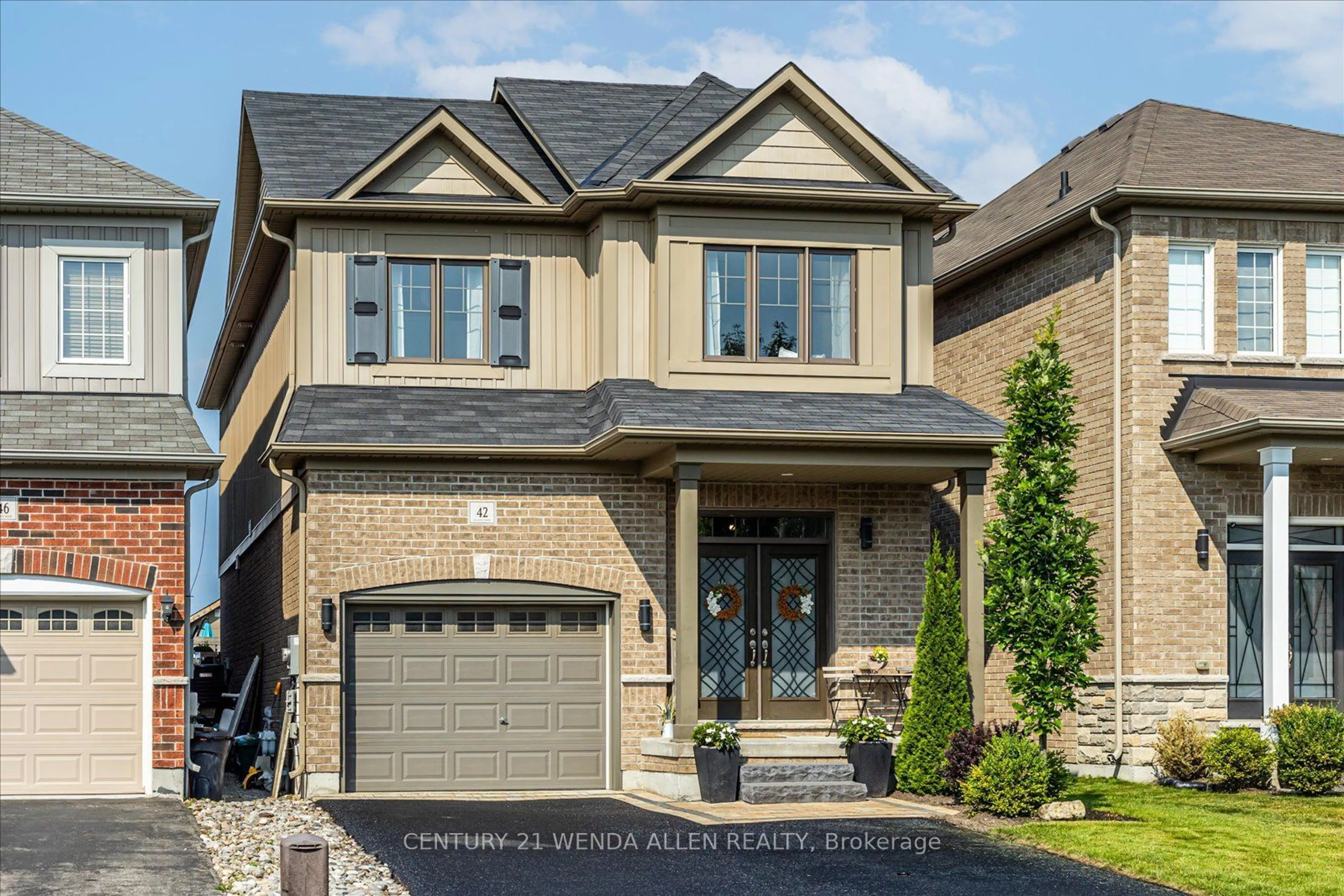 Home with brick exterior material for 42 Arthur Trewin St, Clarington Ontario L1E 0G5