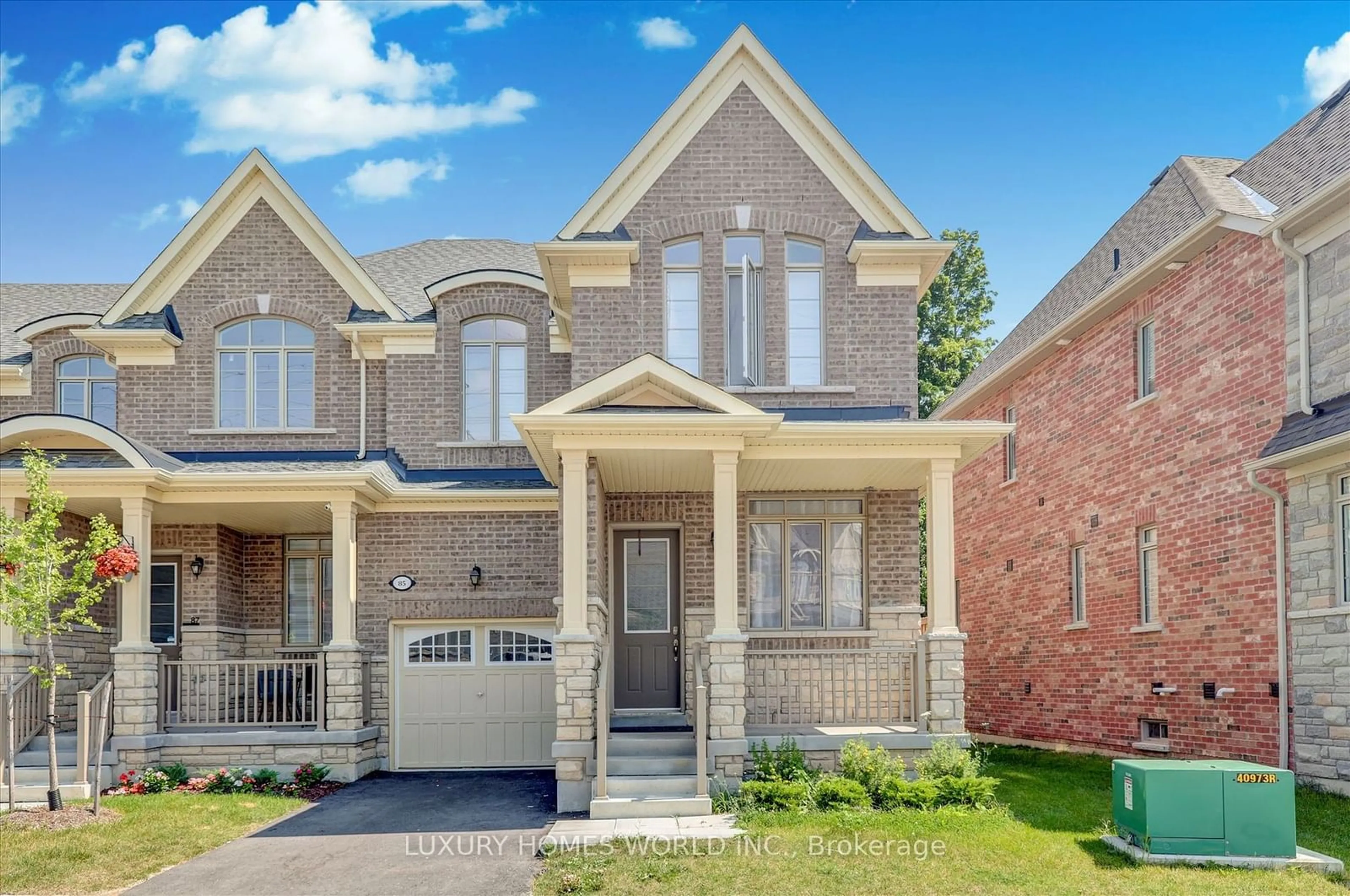 Home with brick exterior material for 85 Hickling Lane, Ajax Ontario L1T 0P9