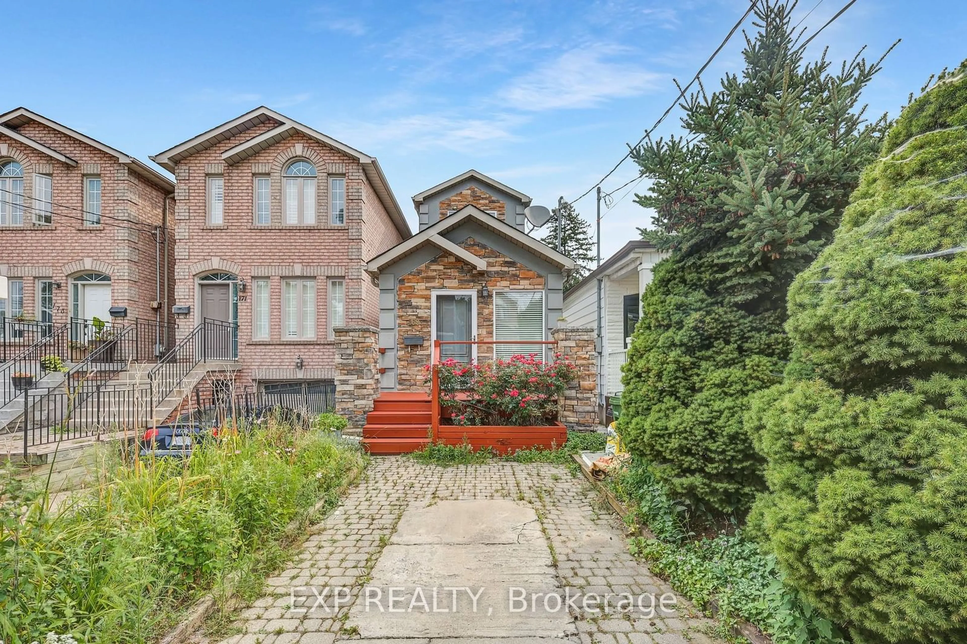 Frontside or backside of a home for 169 King Edward Ave, Toronto Ontario M4C 5J7