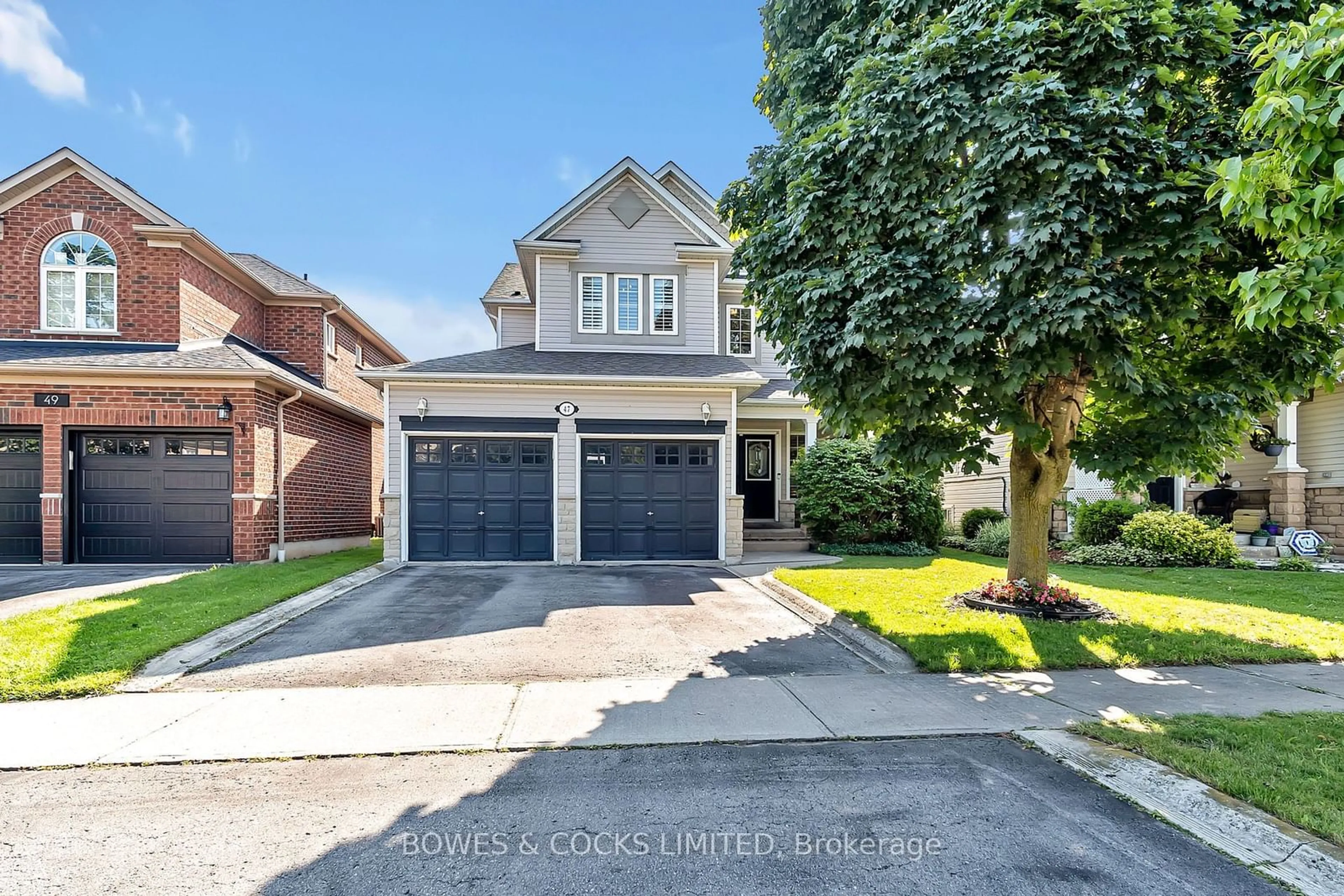 Frontside or backside of a home for 47 Ault Cres, Whitby Ontario L1M 2G7