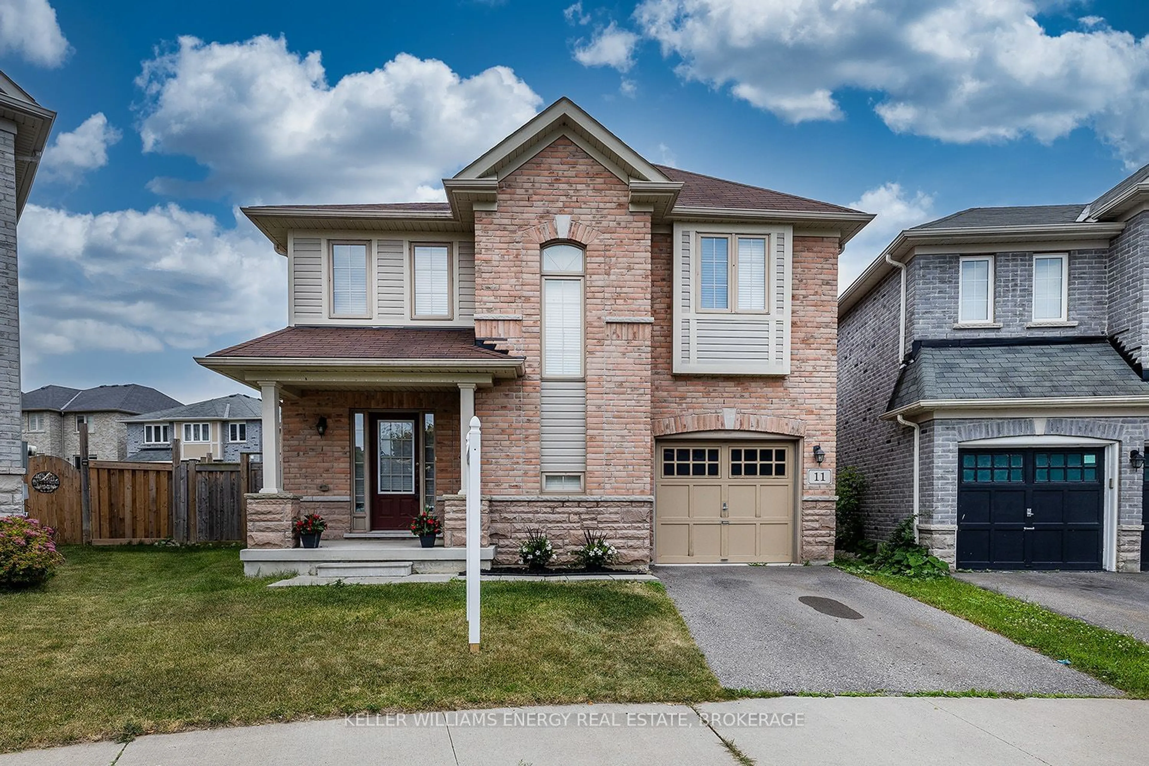 Home with brick exterior material for 11 Mchugh Rd, Ajax Ontario L1Z 0M8