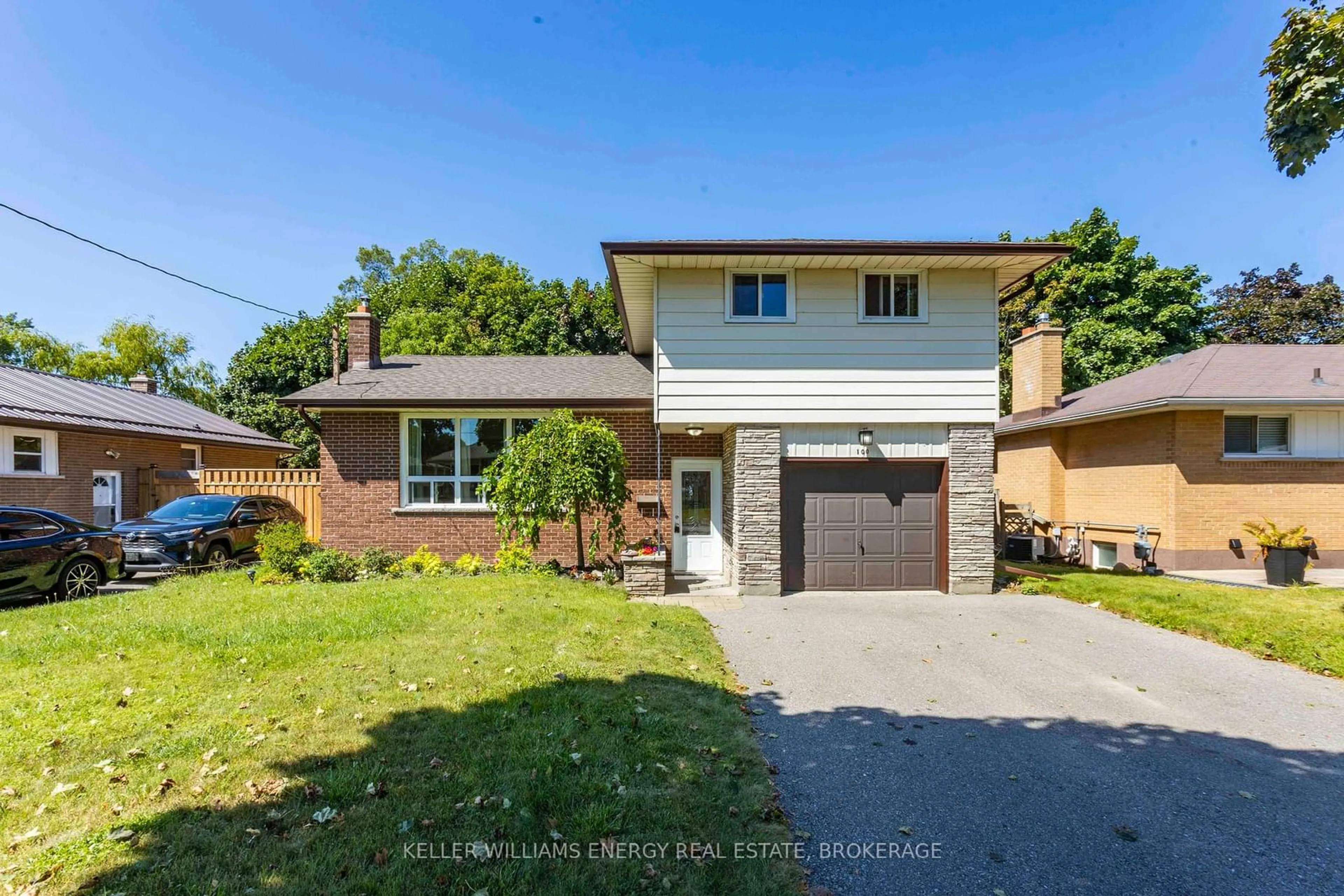 Frontside or backside of a home for 100 Labrador Dr, Oshawa Ontario L1H 7E3