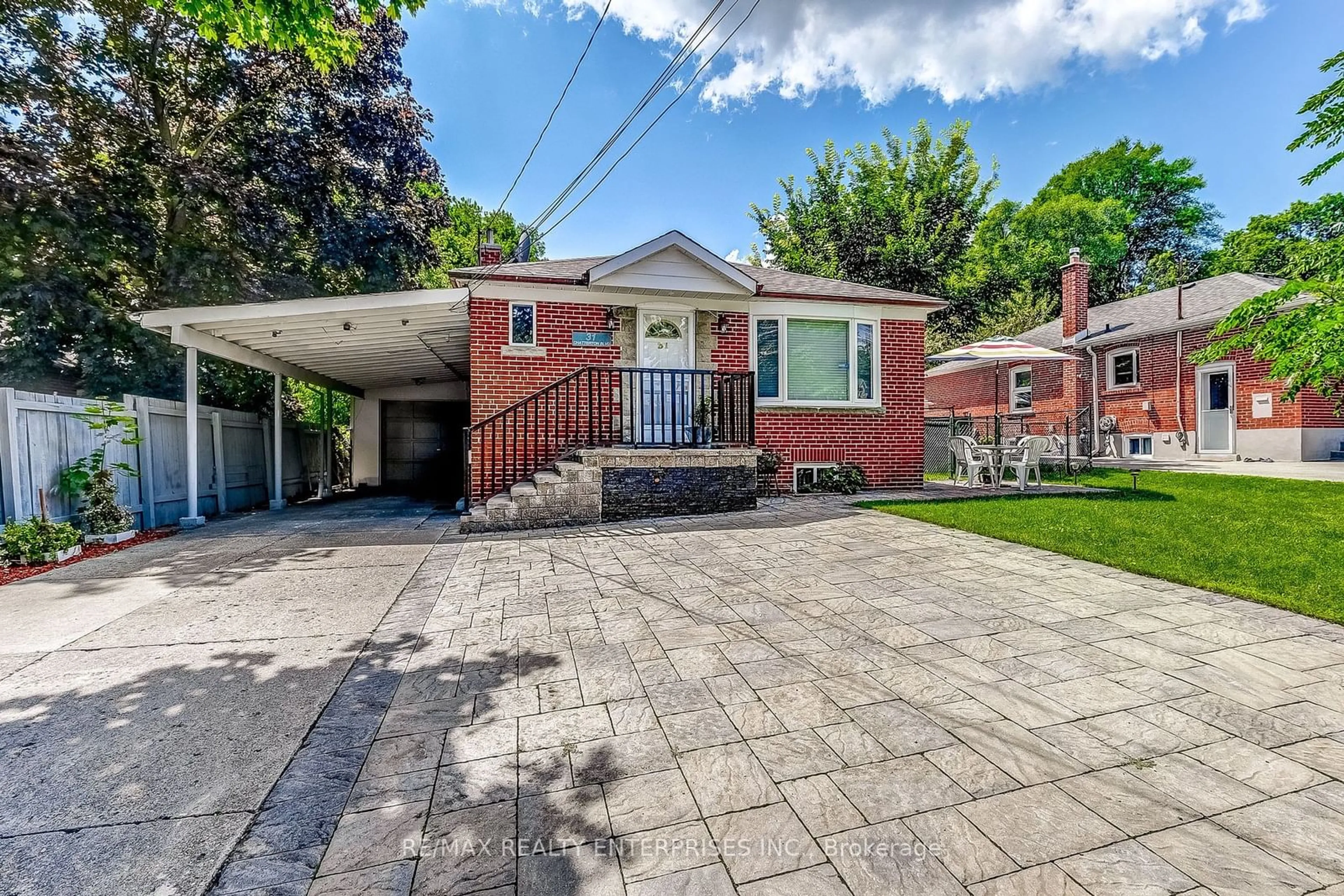 Home with brick exterior material for 31 Chatterton Blvd, Toronto Ontario M1M 2G3