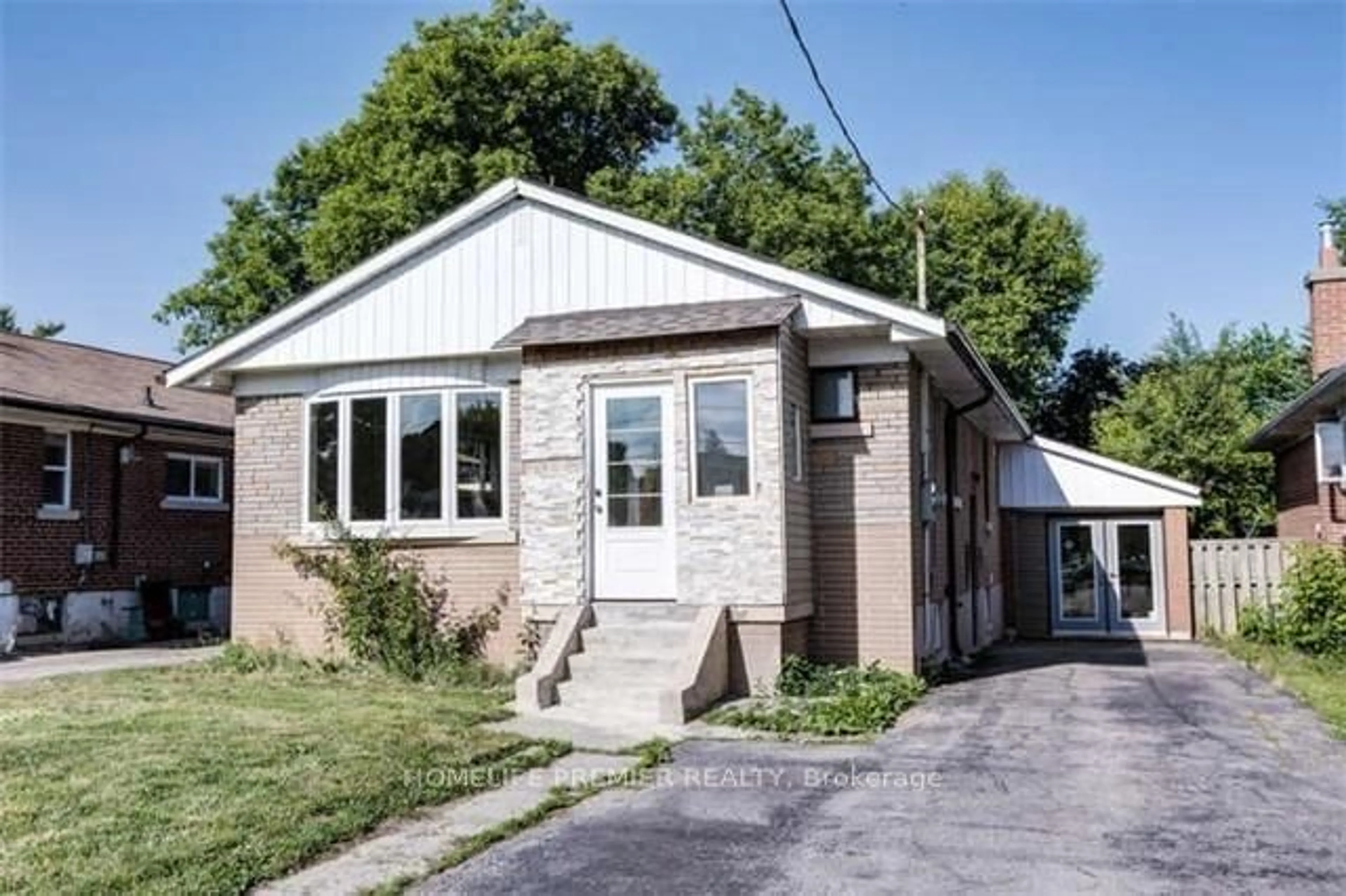 Frontside or backside of a home for 765 Markham Rd, Toronto Ontario M1H 2Y1