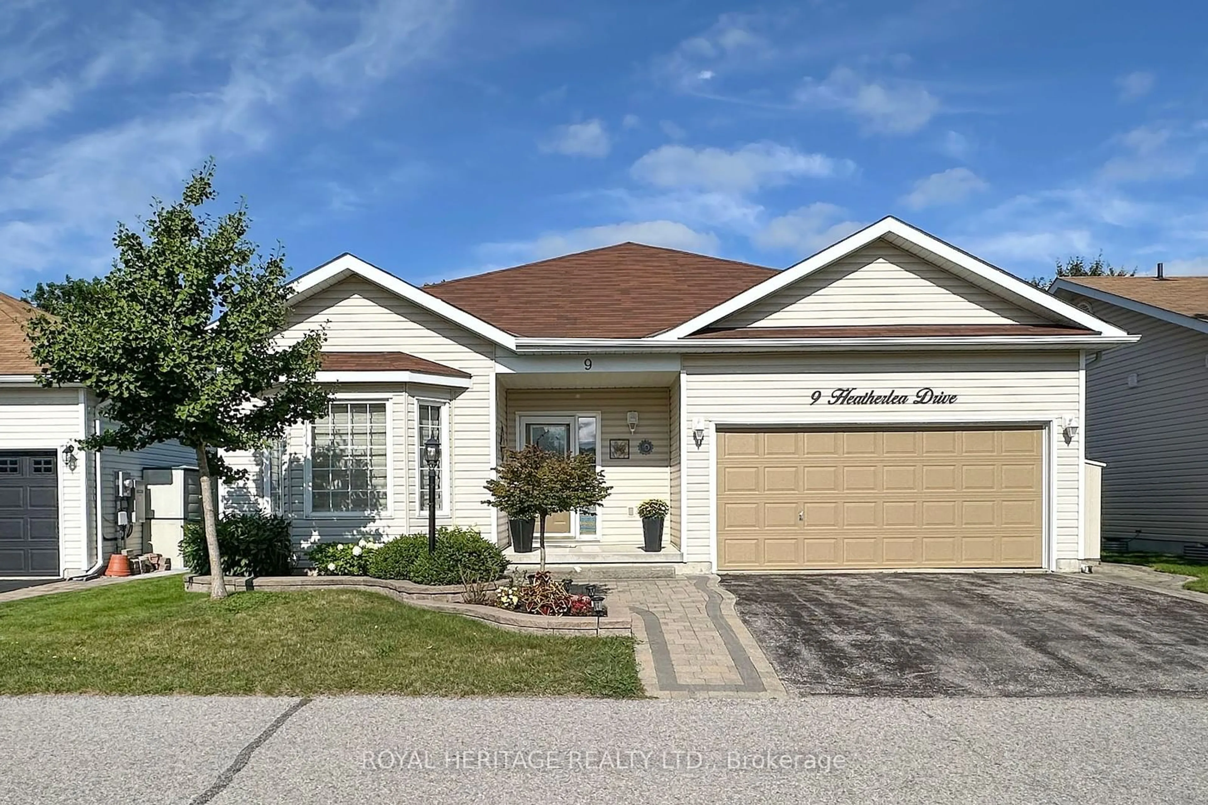 Frontside or backside of a home for 9 Heatherlea Dr, Clarington Ontario L1B 0B1