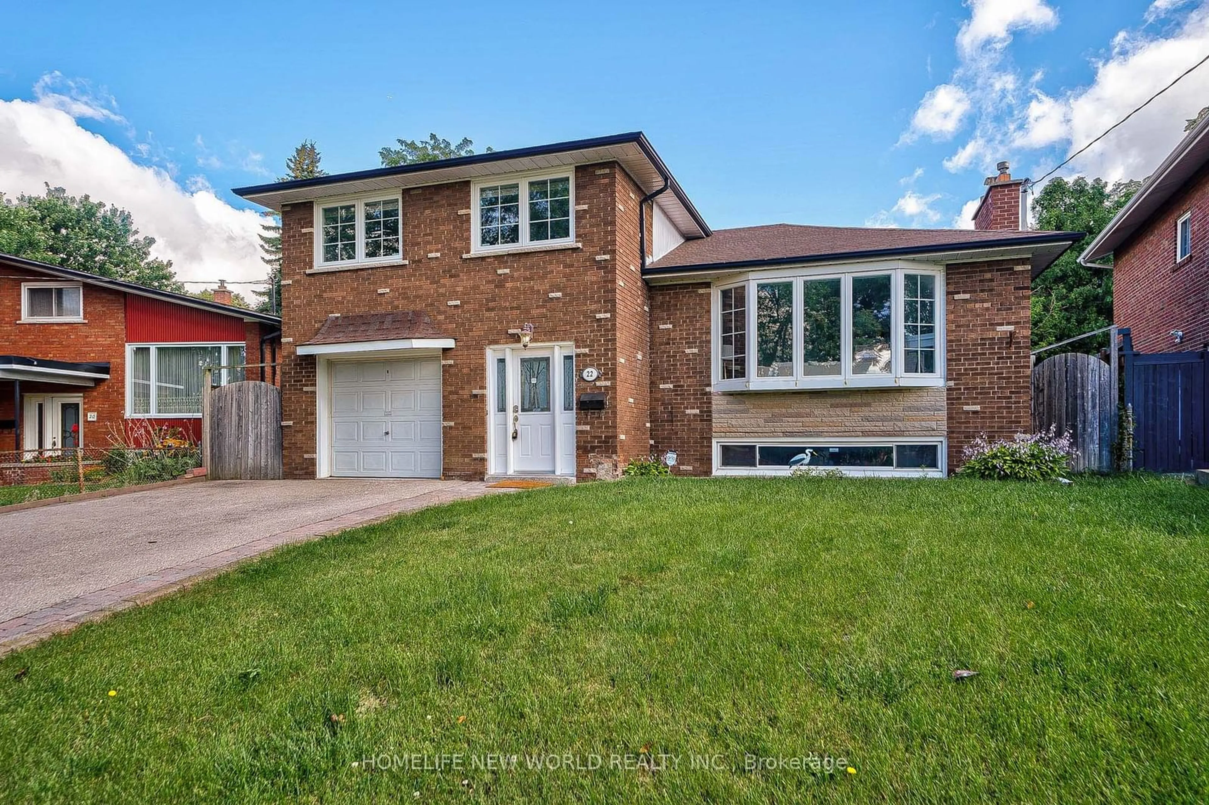 Frontside or backside of a home for 22 Jarwick Dr, Toronto Ontario M1H 2H2