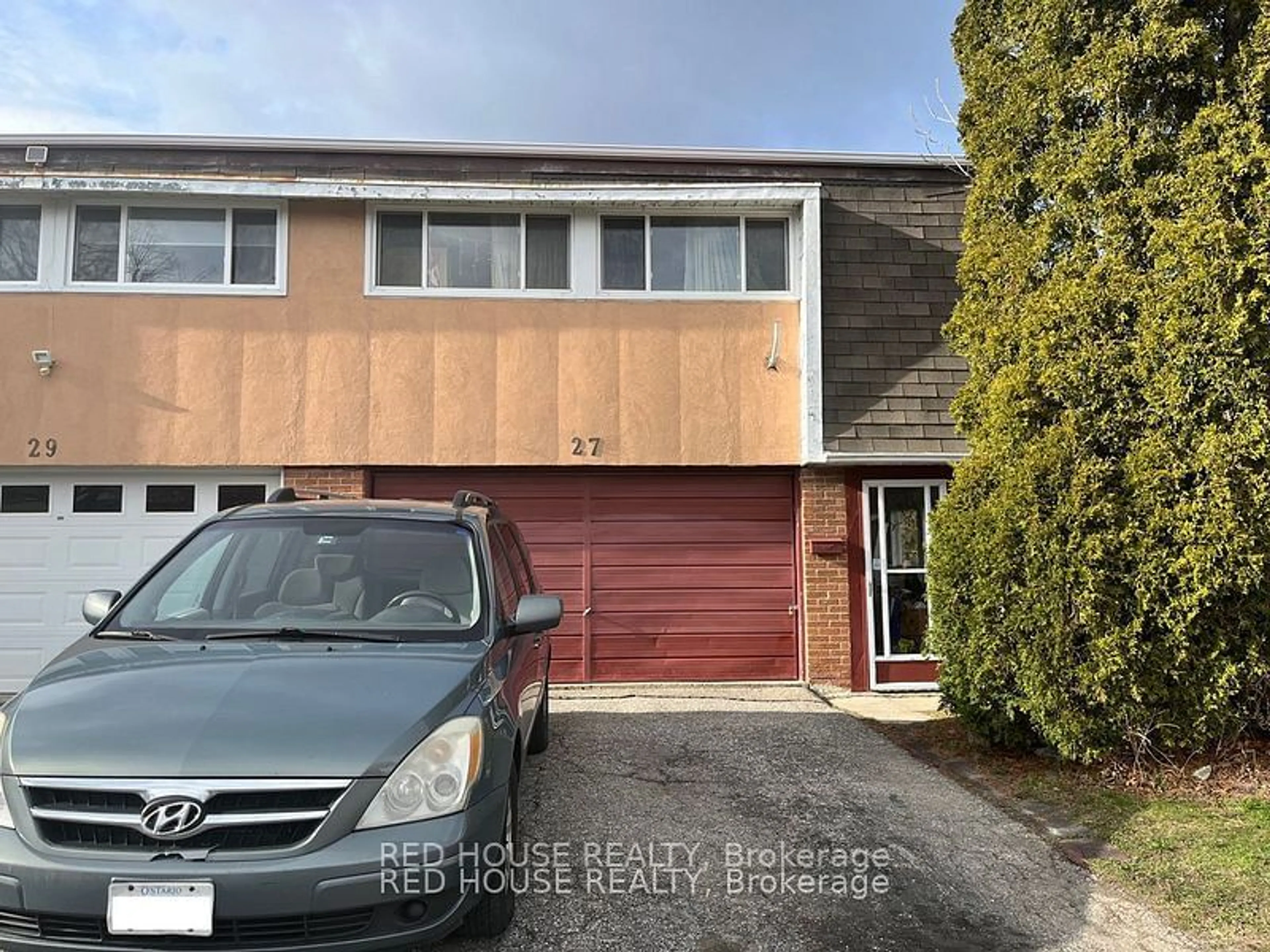 Frontside or backside of a home, the street view for 27 Heatherside Dr, Toronto Ontario M1W 1T6