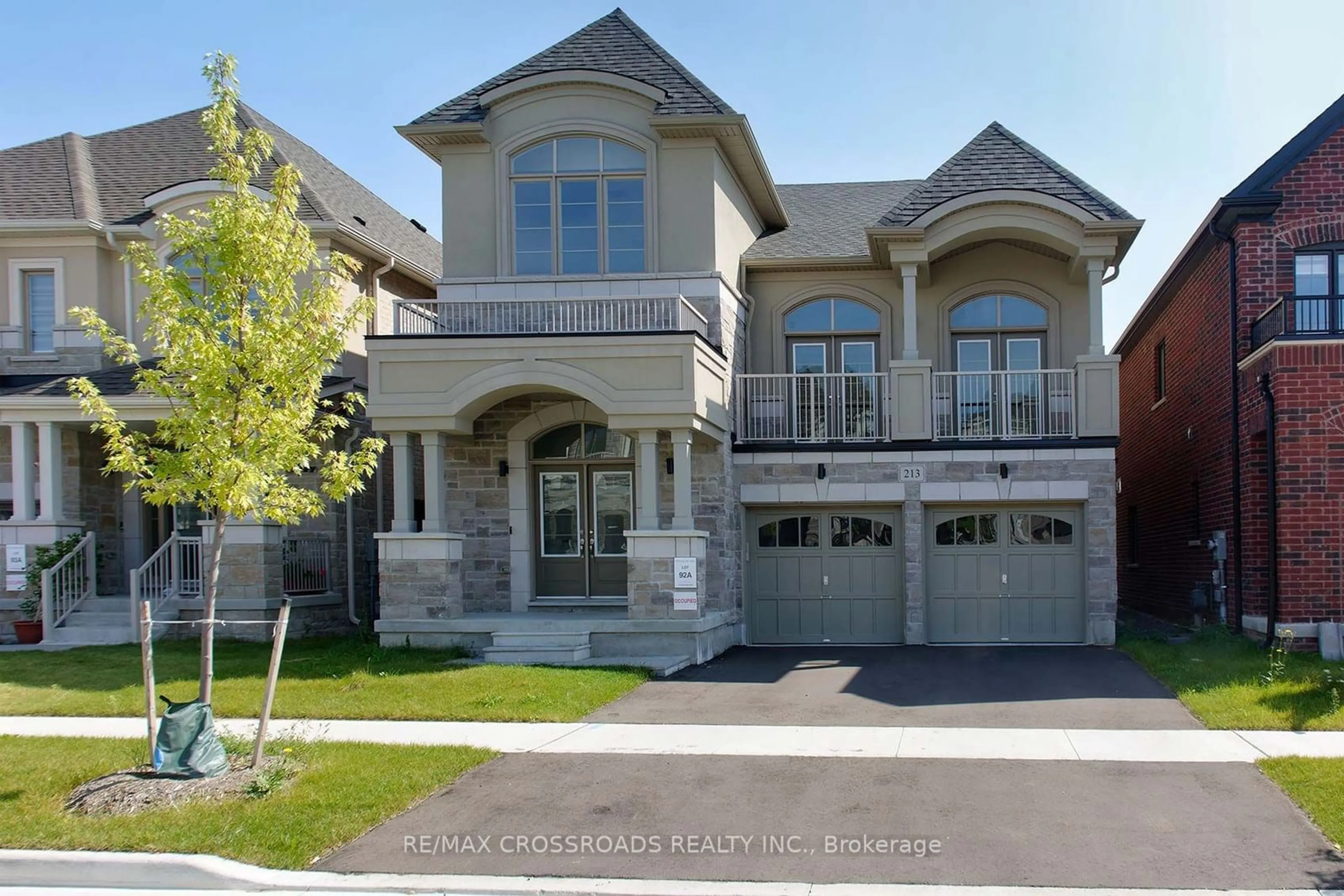 Frontside or backside of a home, the street view for 213 Doug Finney St, Oshawa Ontario L1K 3G3