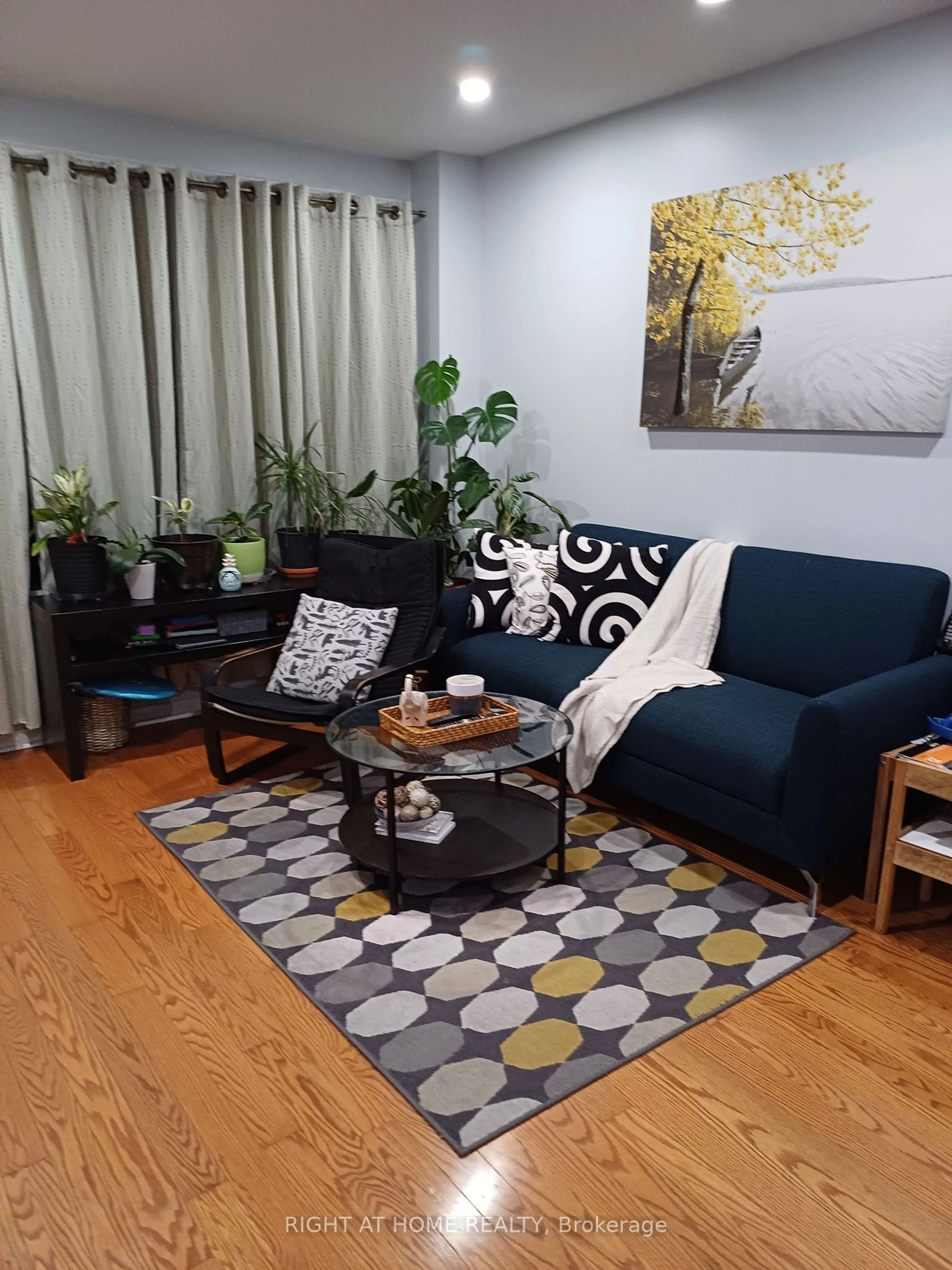 Living room, wood floors for 29 Rosebank Dr #212, Toronto Ontario M1B 5Y7