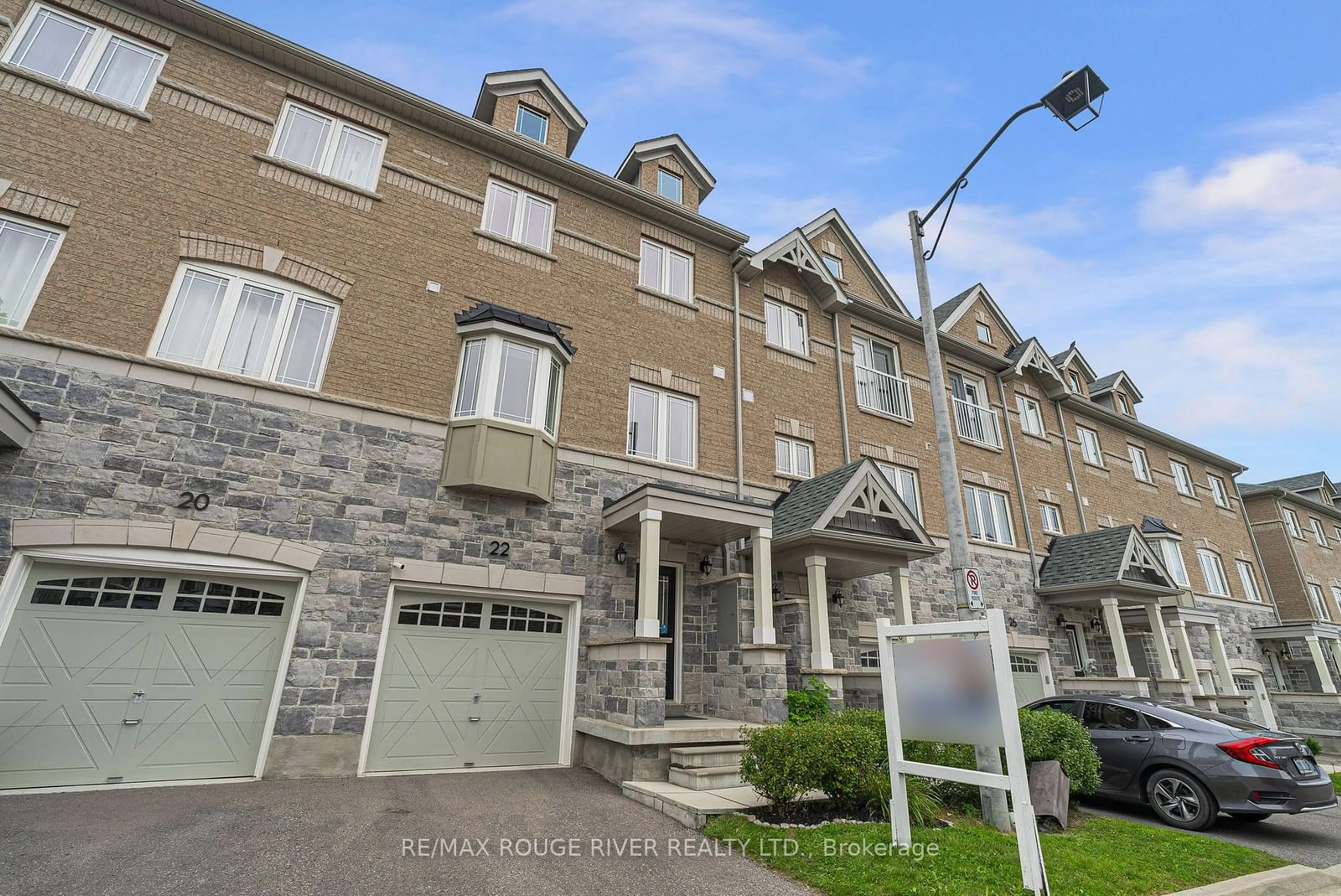 A pic from exterior of the house or condo for 22 Waterstone Way, Whitby Ontario L1M 0M3