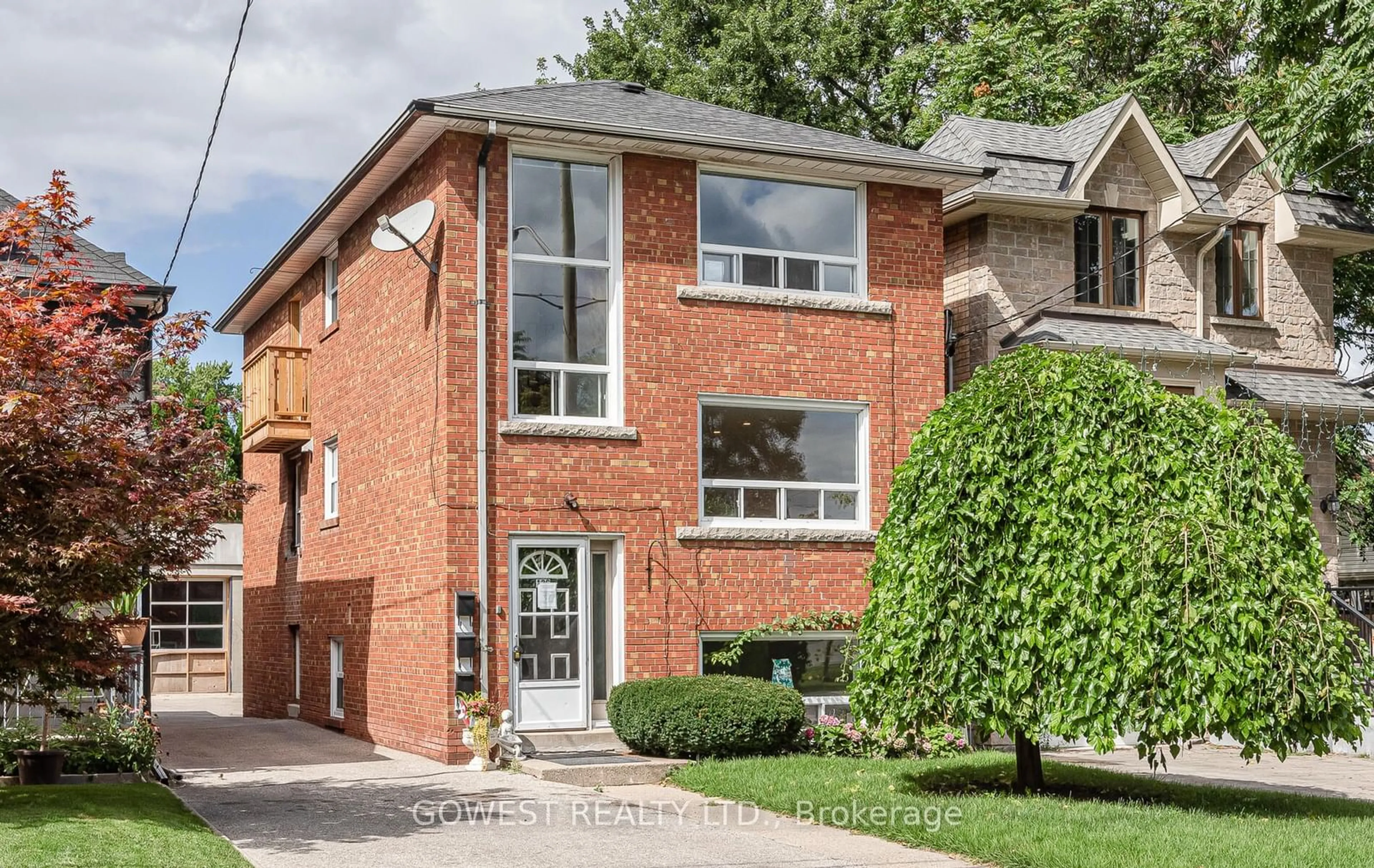 Home with brick exterior material for 126 Barker Ave, Toronto Ontario M4C 2N9