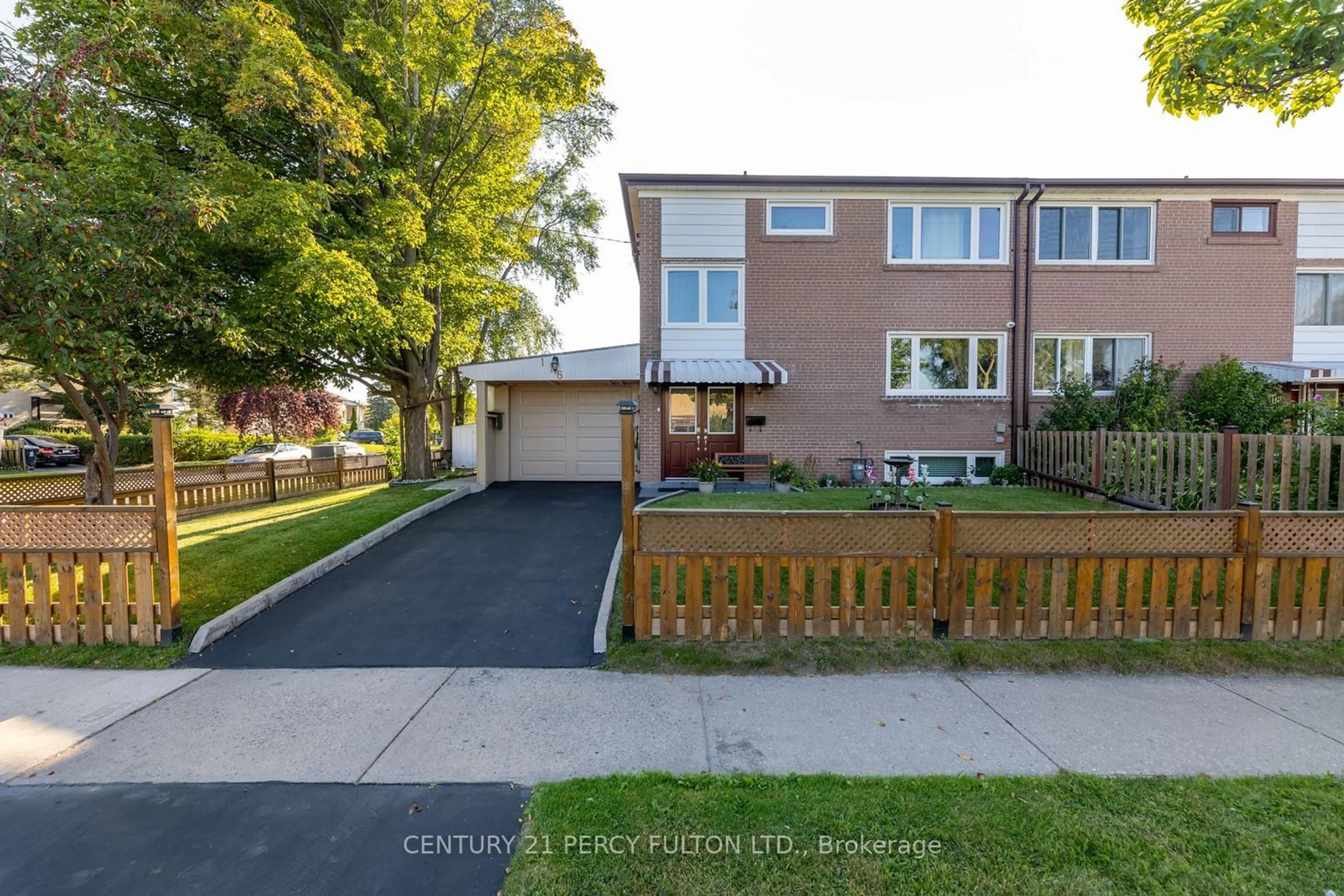 A pic from exterior of the house or condo, the fenced backyard for 116 Overture Rd, Toronto Ontario M1E 2W4