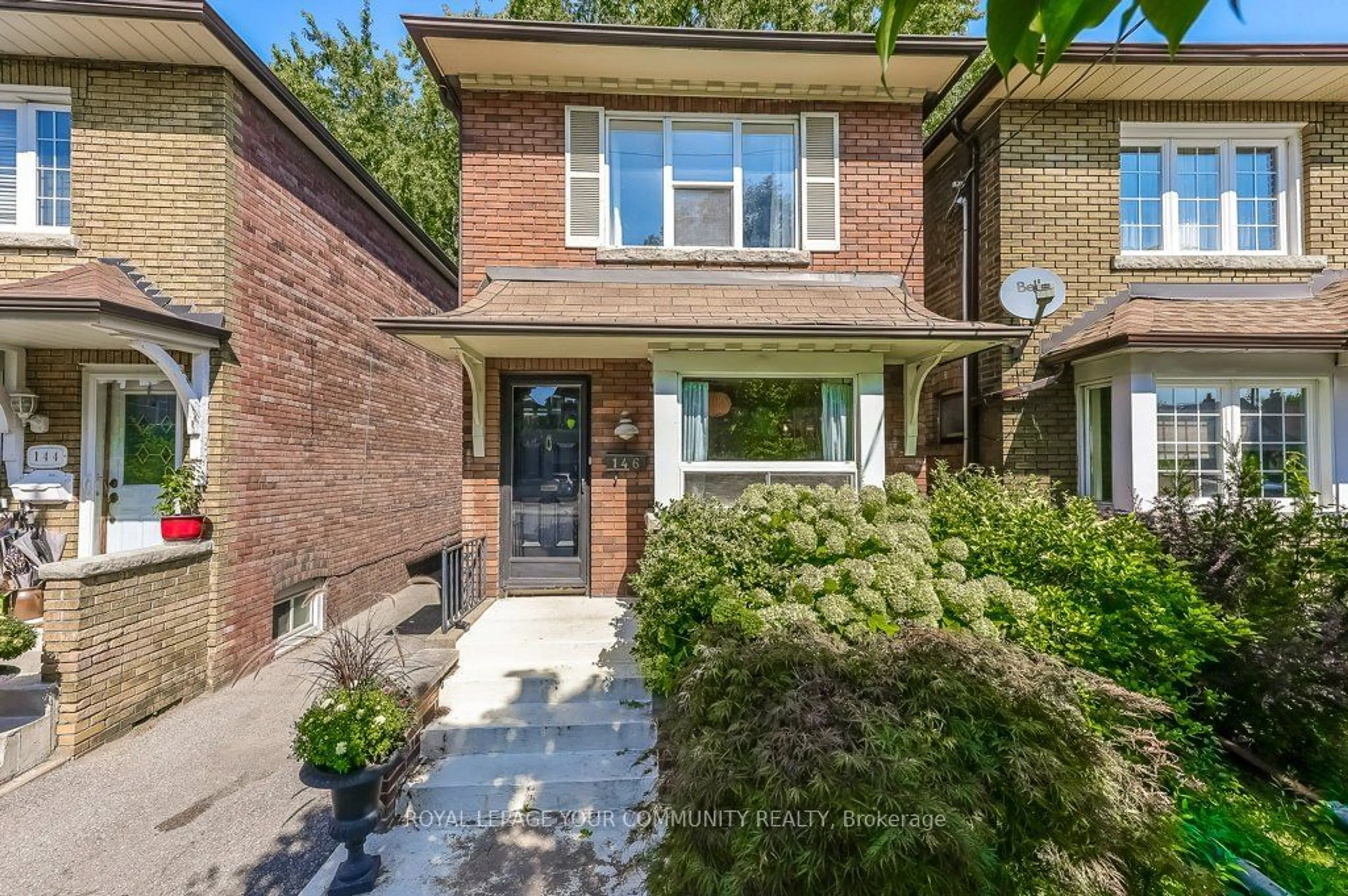 Home with brick exterior material for 146 Floyd Ave, Toronto Ontario M4K 2B7