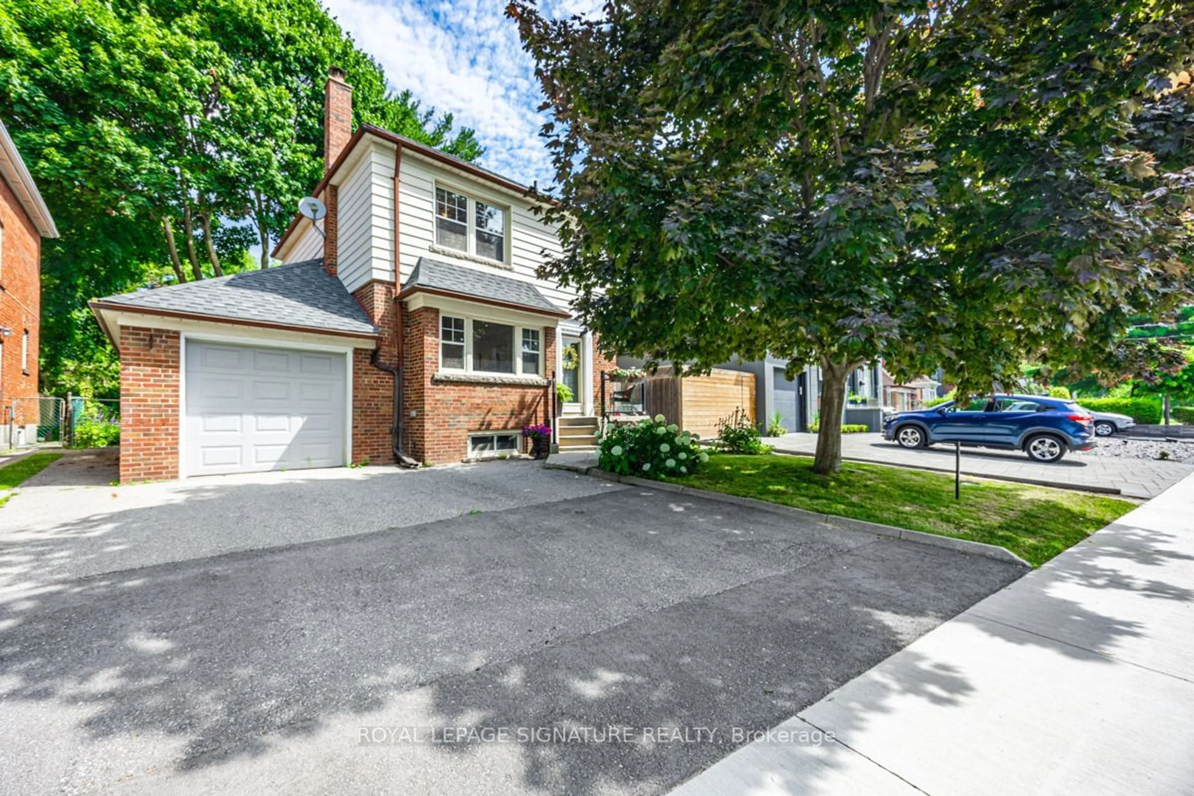 Frontside or backside of a home, the street view for 44 Parkview Hill Cres, Toronto Ontario M4B 1P9